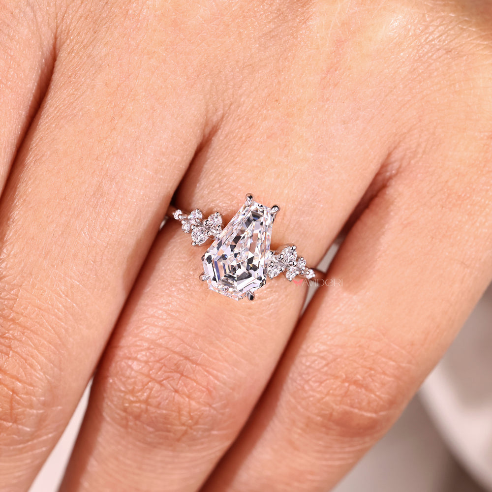 Coffin cut lab grown diamond ring in muse setting.
