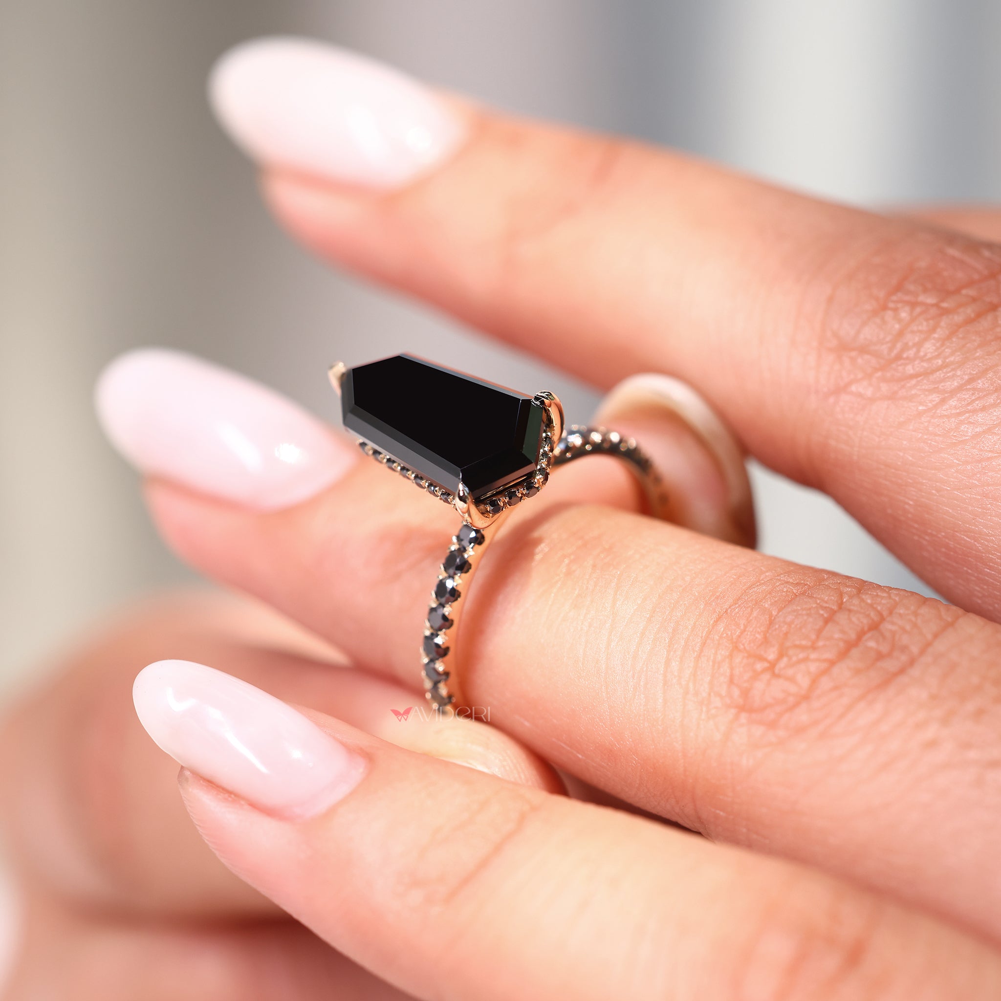 Yellow gold engagement ring with a sleek modern design.
