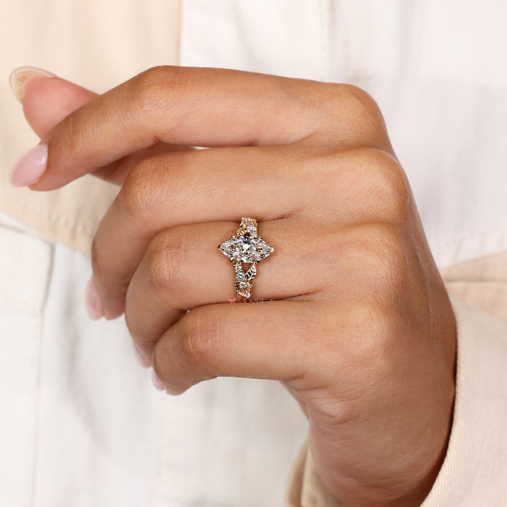 Marquise ring with V prong and claw setting.
