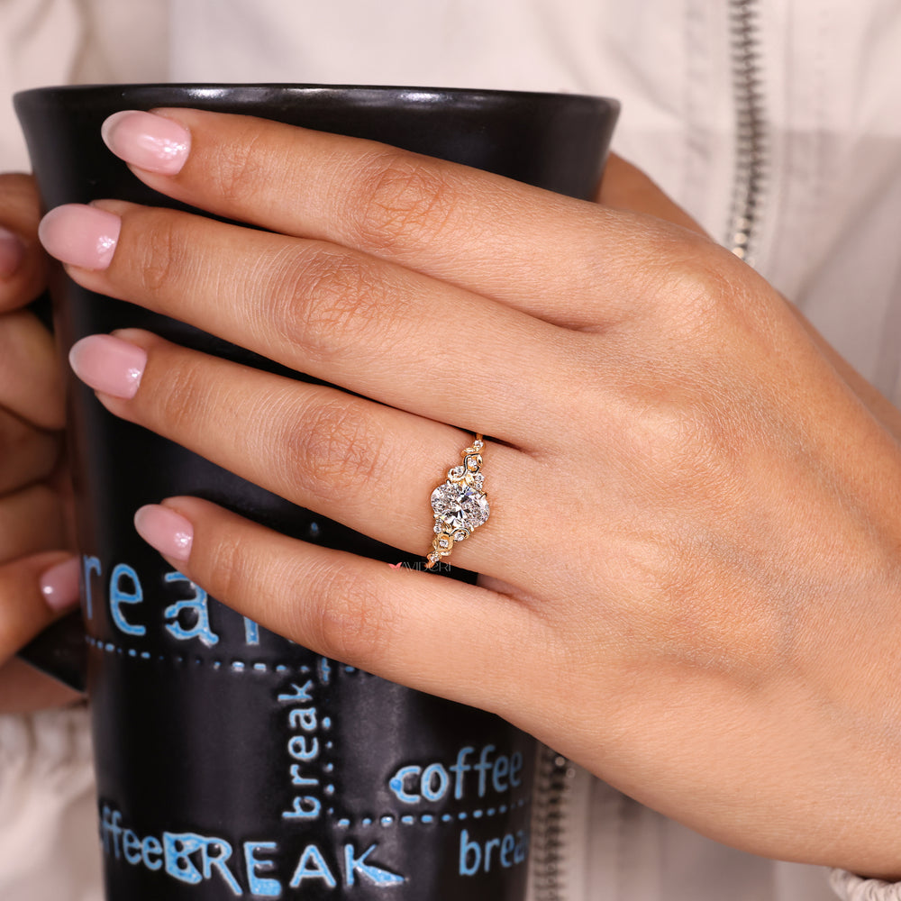 Nature inspired oval diamond ring claw prong.
