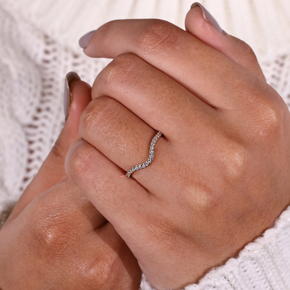 Classic curved gold wedding band with high-quality diamonds for a refined look.
