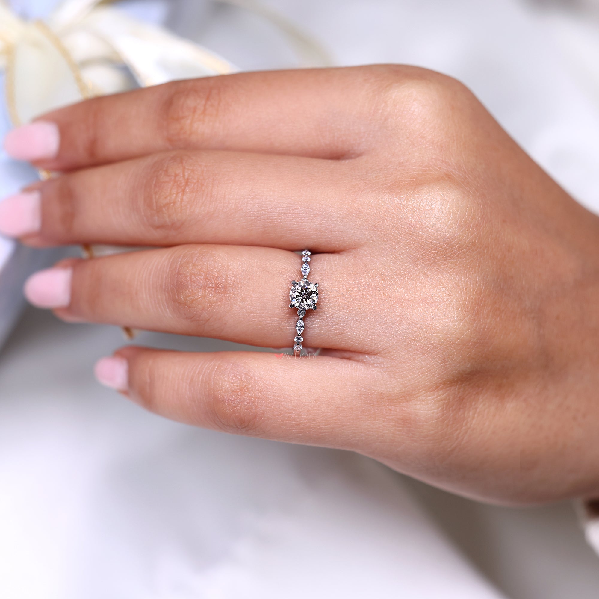 Buy engagement ring with a stunning round cut diamond.
