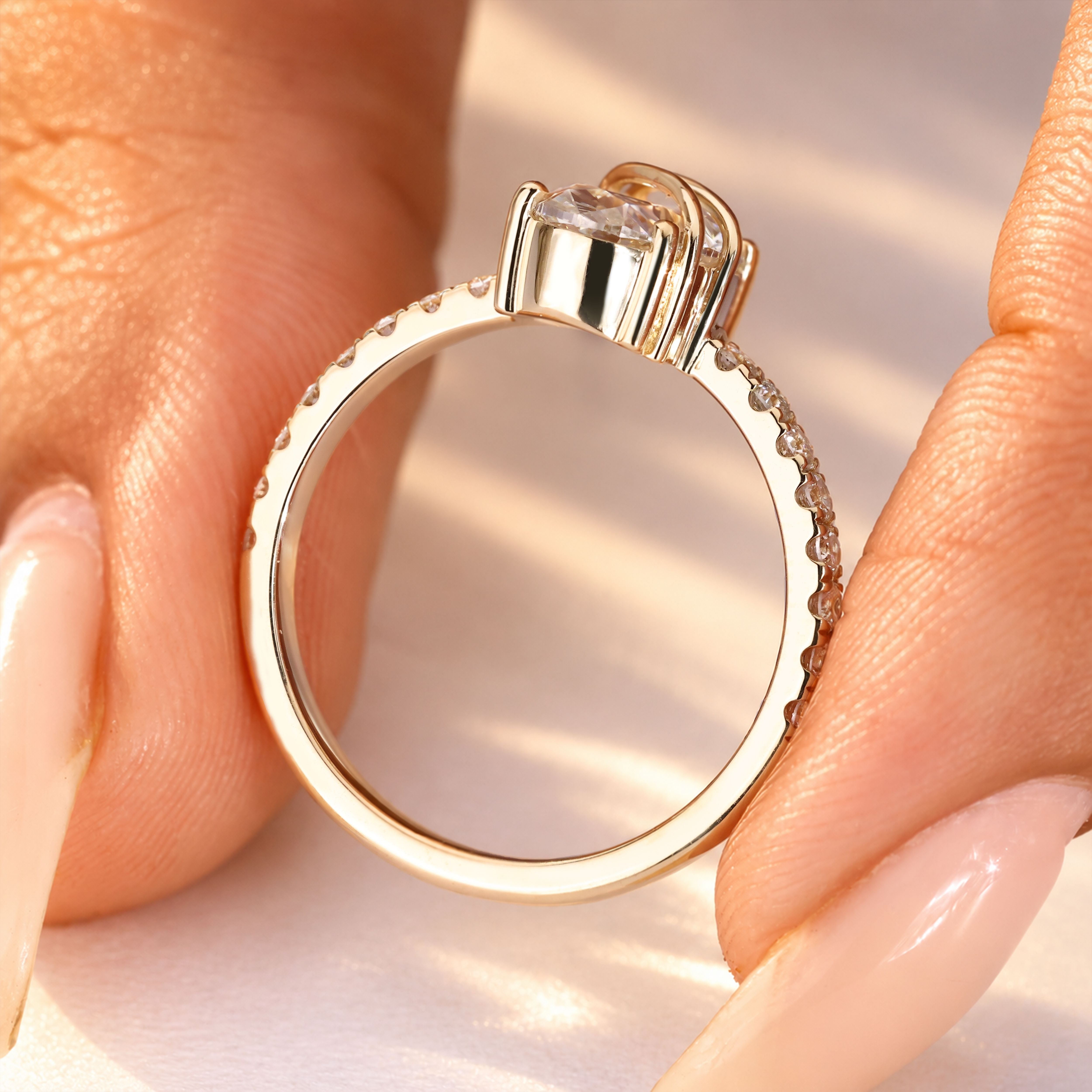 Handmade oval diamond ring with regal detailing.
