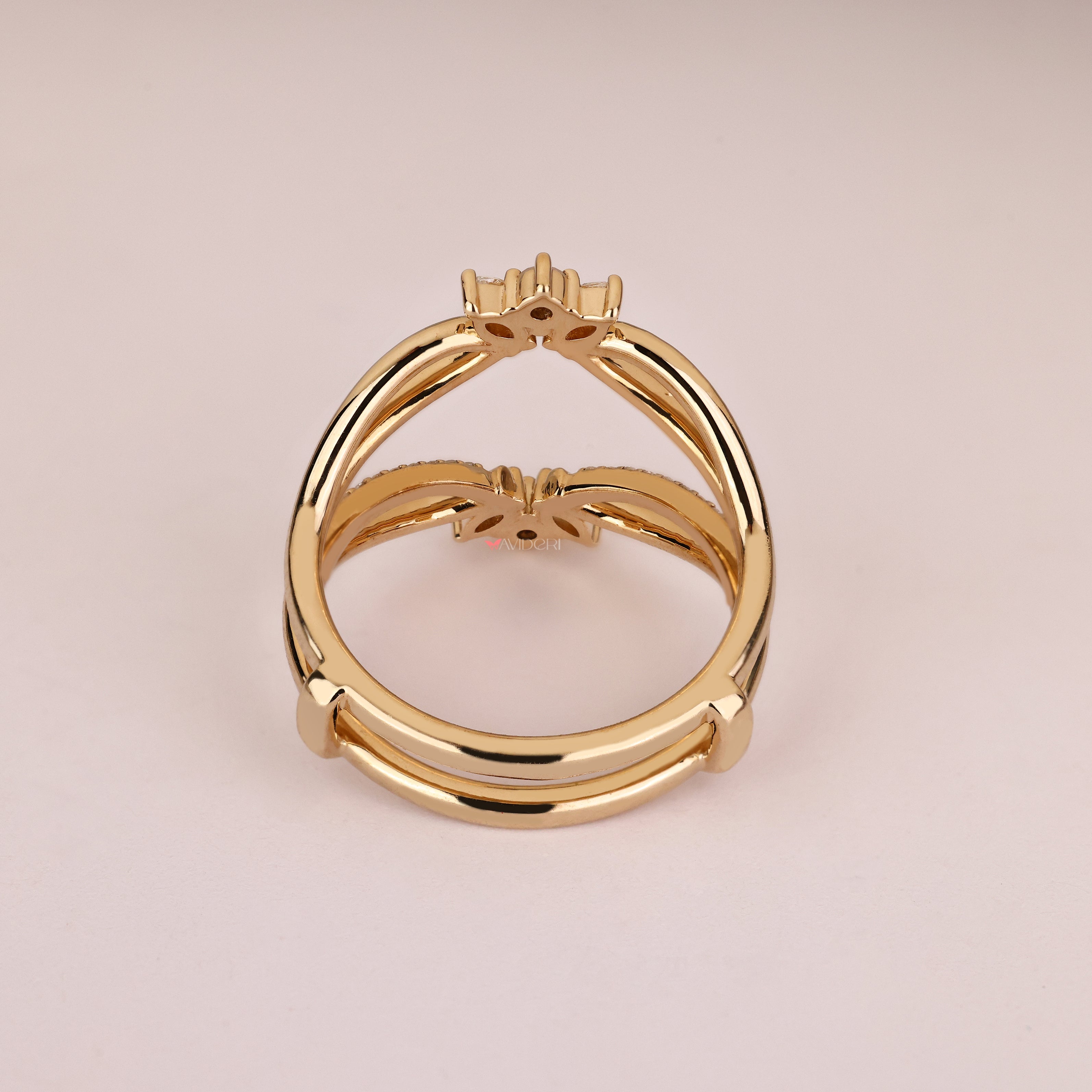 Handmade marquise and round diamond enhancer.
