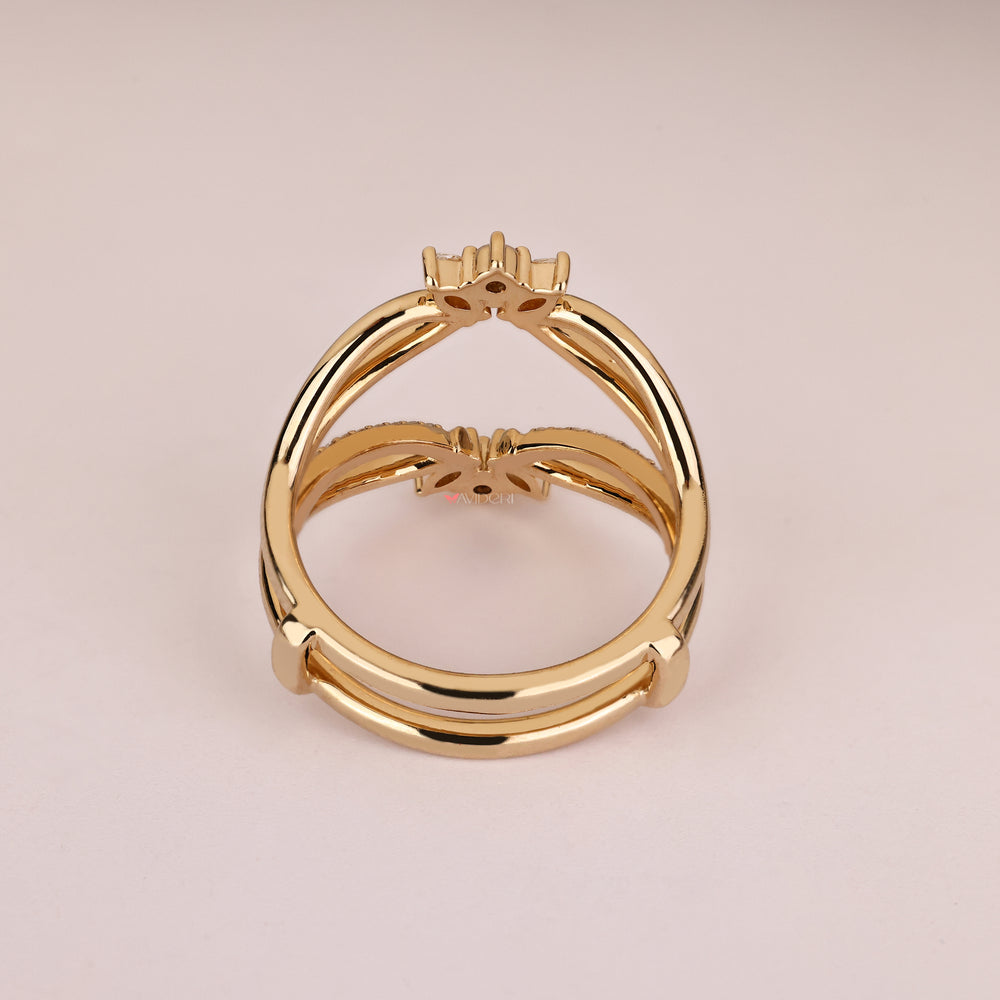 Handmade marquise and round diamond enhancer.
