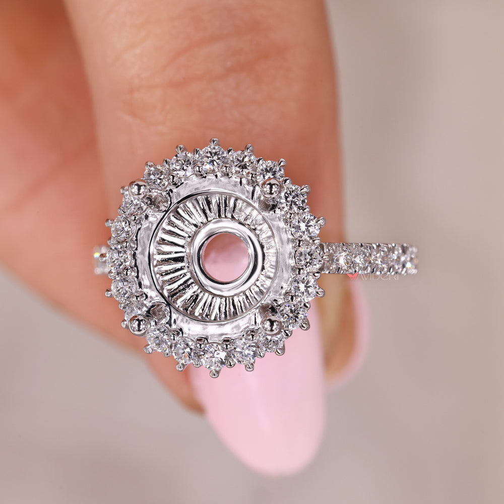 Cluster halo engagement ring with cathedral setting.