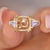 Semi mount 3 stone engagement ring in yellow gold.
