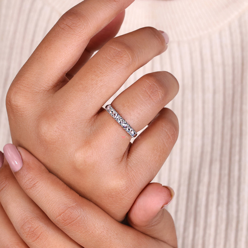 Round Rose Cut diamond featured in a sleek wedding band for modern elegance.
