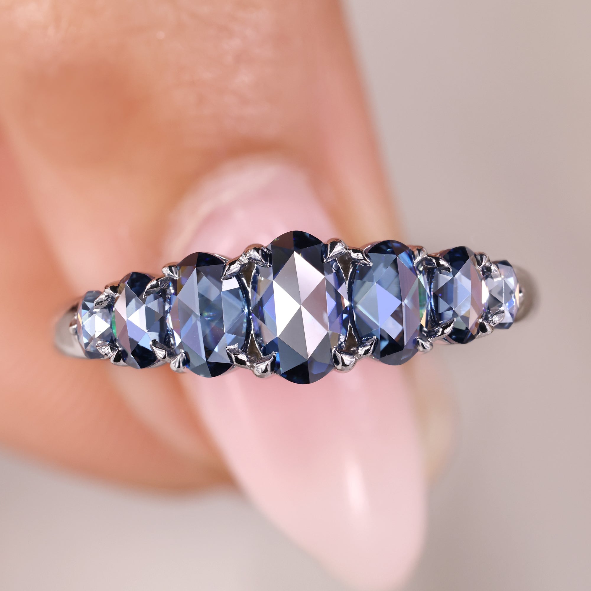 Seven stone band with oval rose cut wedding band.