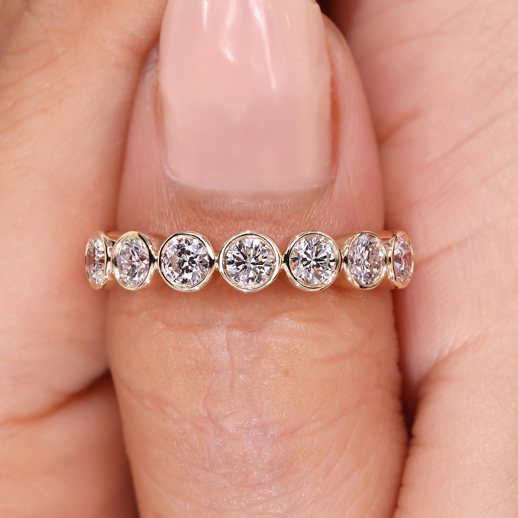 Round diamond wedding band with half eternity band.