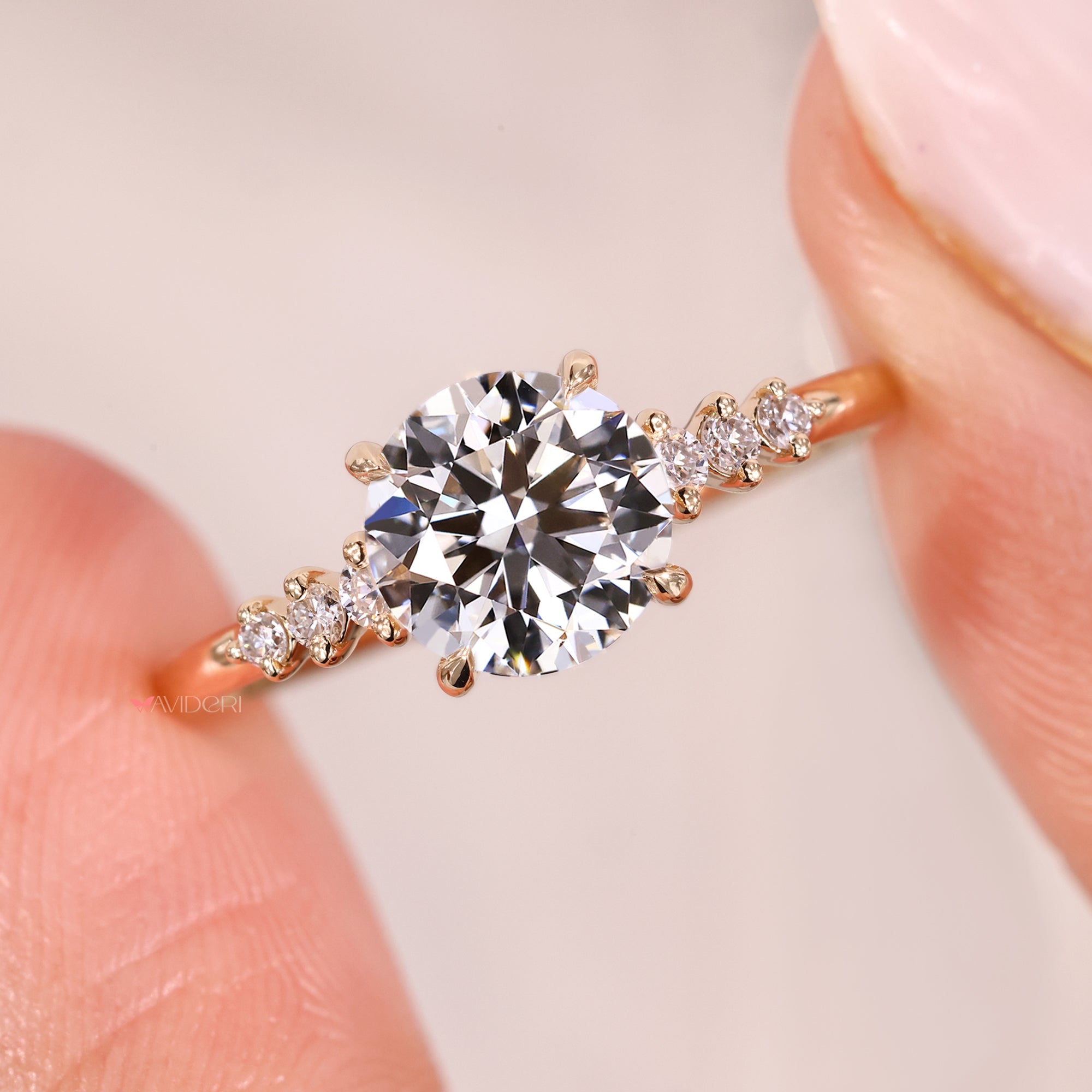 Prong setting ring featuring round diamonds on band.