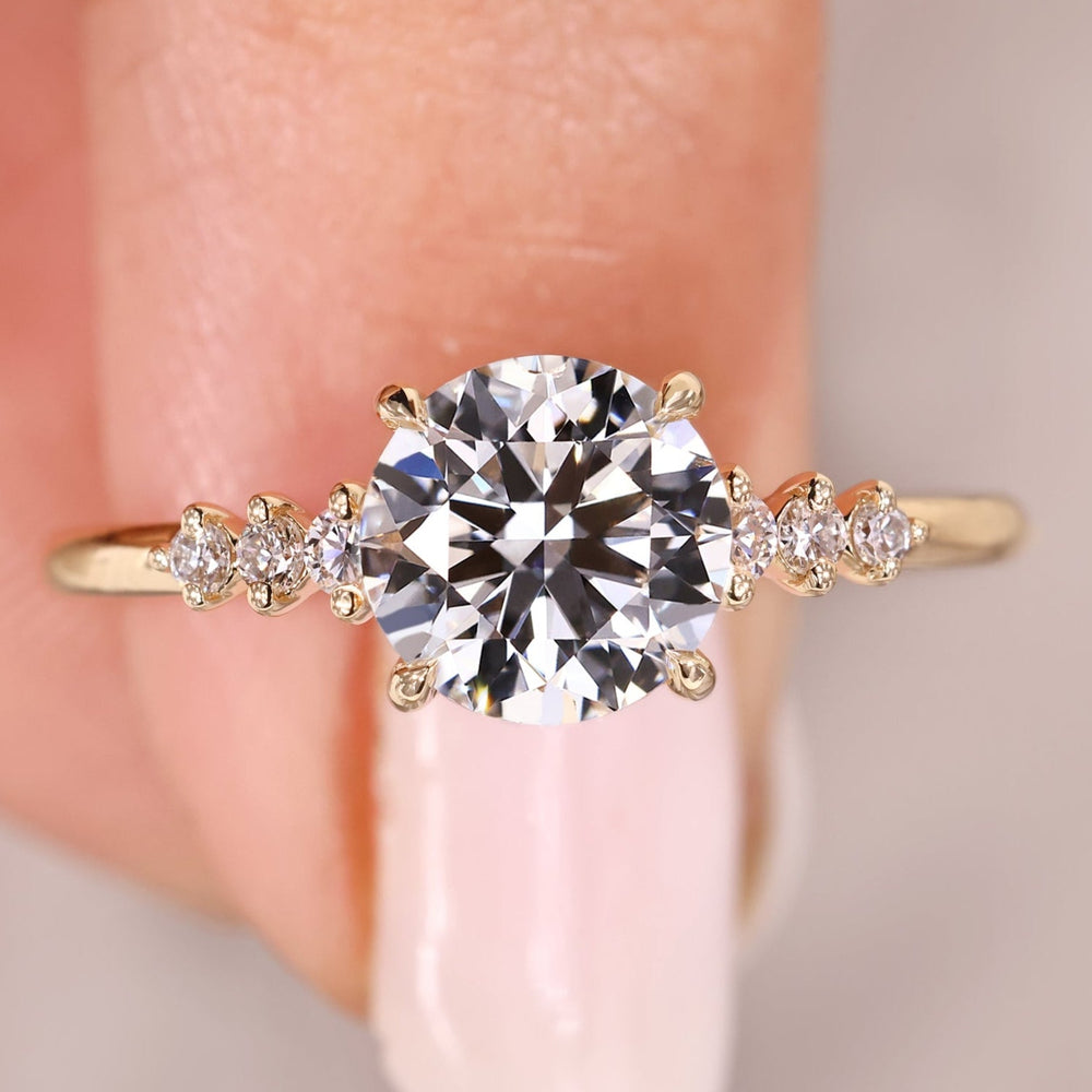 Seven stone engagement ring with round diamonds.