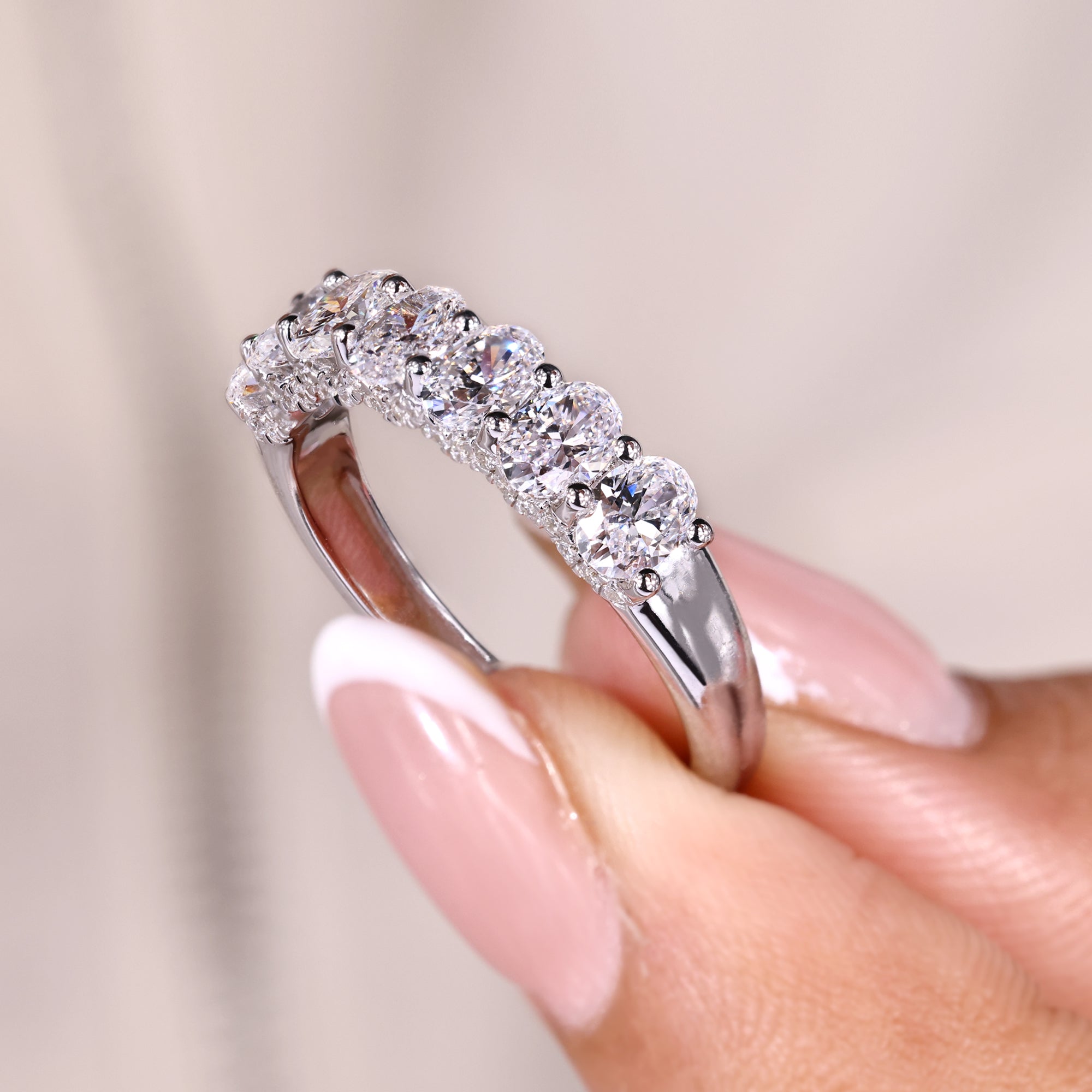 Tapered shank band in half eternity wedding band.