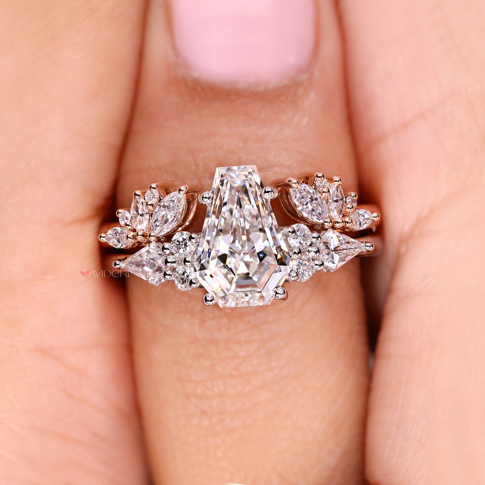 Tapered shank ring with a coffin cut center stone.