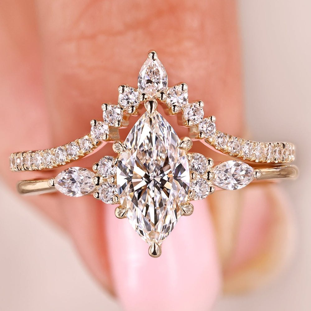 Marquise engagement ring with a tapered shank design.