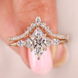 Marquise engagement ring with a tapered shank design.