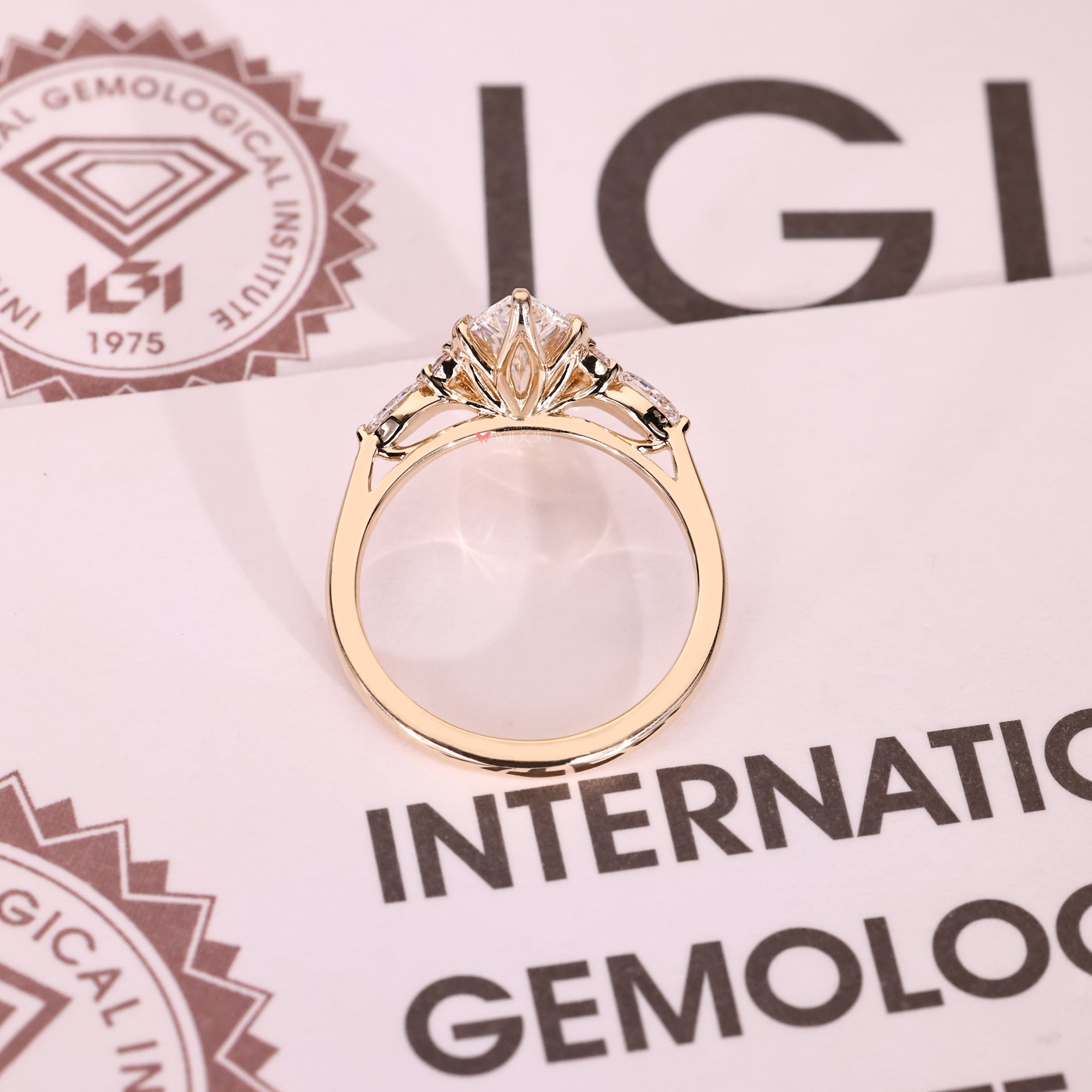 Handmade marquise diamond ring with tulip setting.
