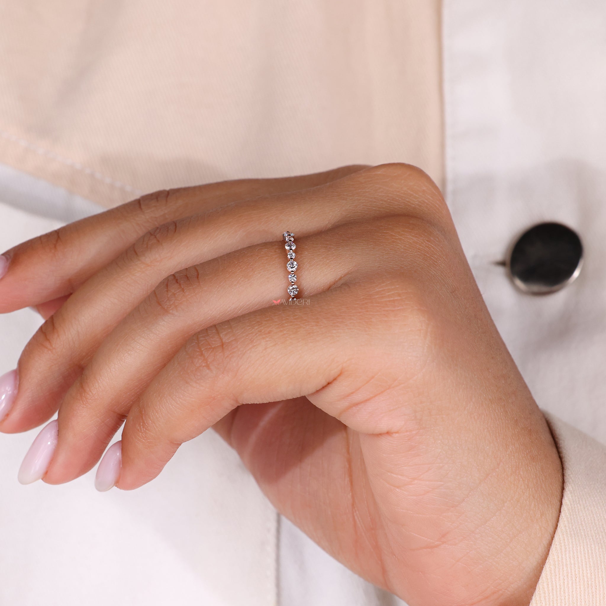 Lab Grown Diamond round diamond eternity band for an eco-friendly option.
