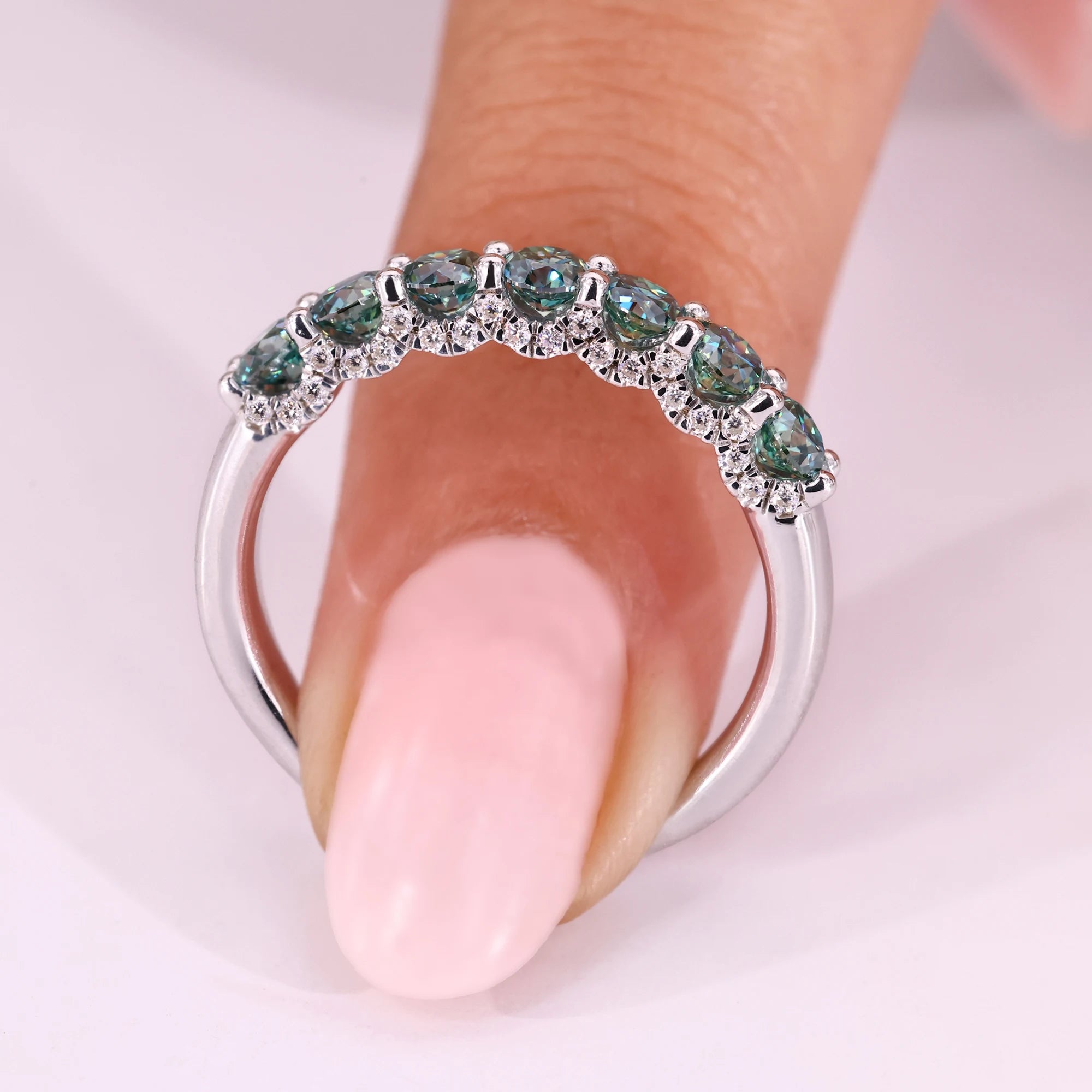 Round cut wedding band with 7 stone band.
