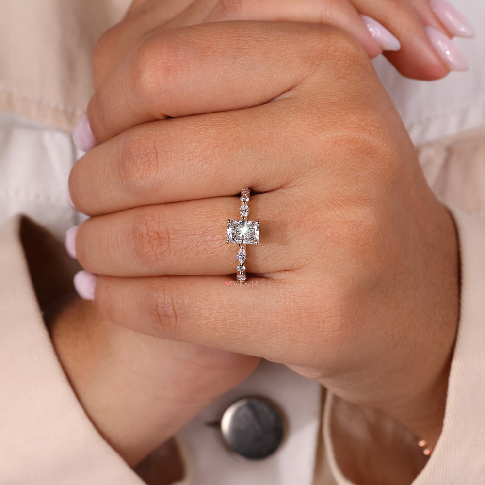 Avideri ring featuring radiant engagement ring with hidden halo.
