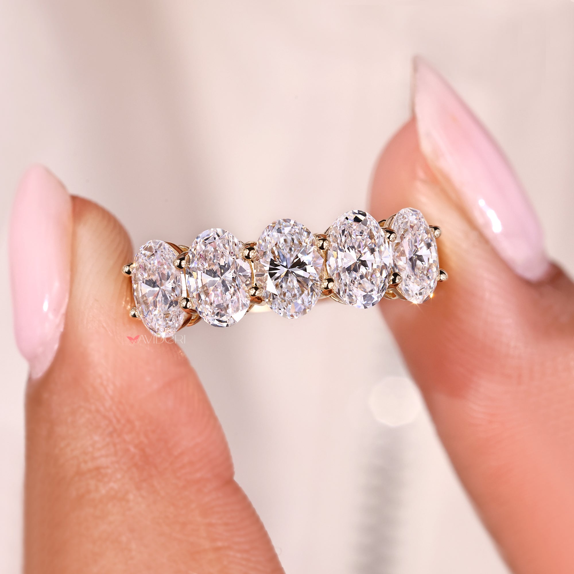 Avideri band with oval lab grown diamonds.