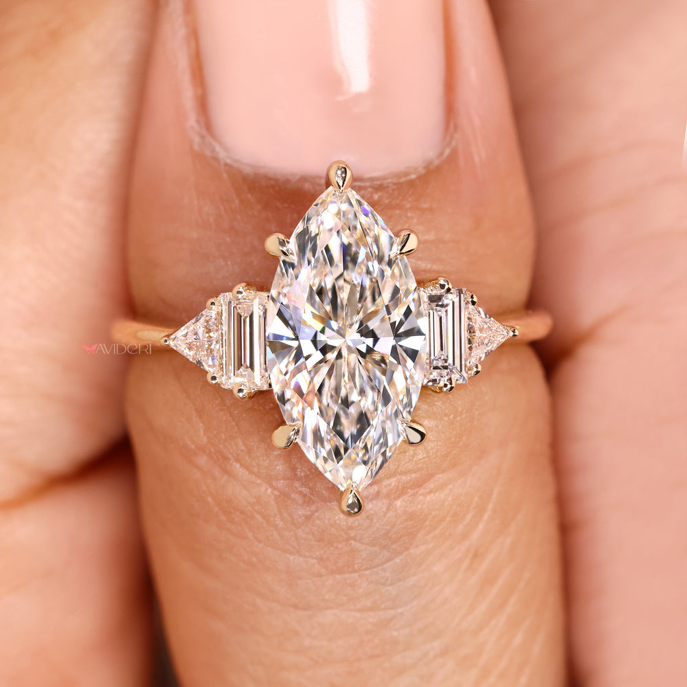 Marquise lab diamond ring with basket and claw setting.
