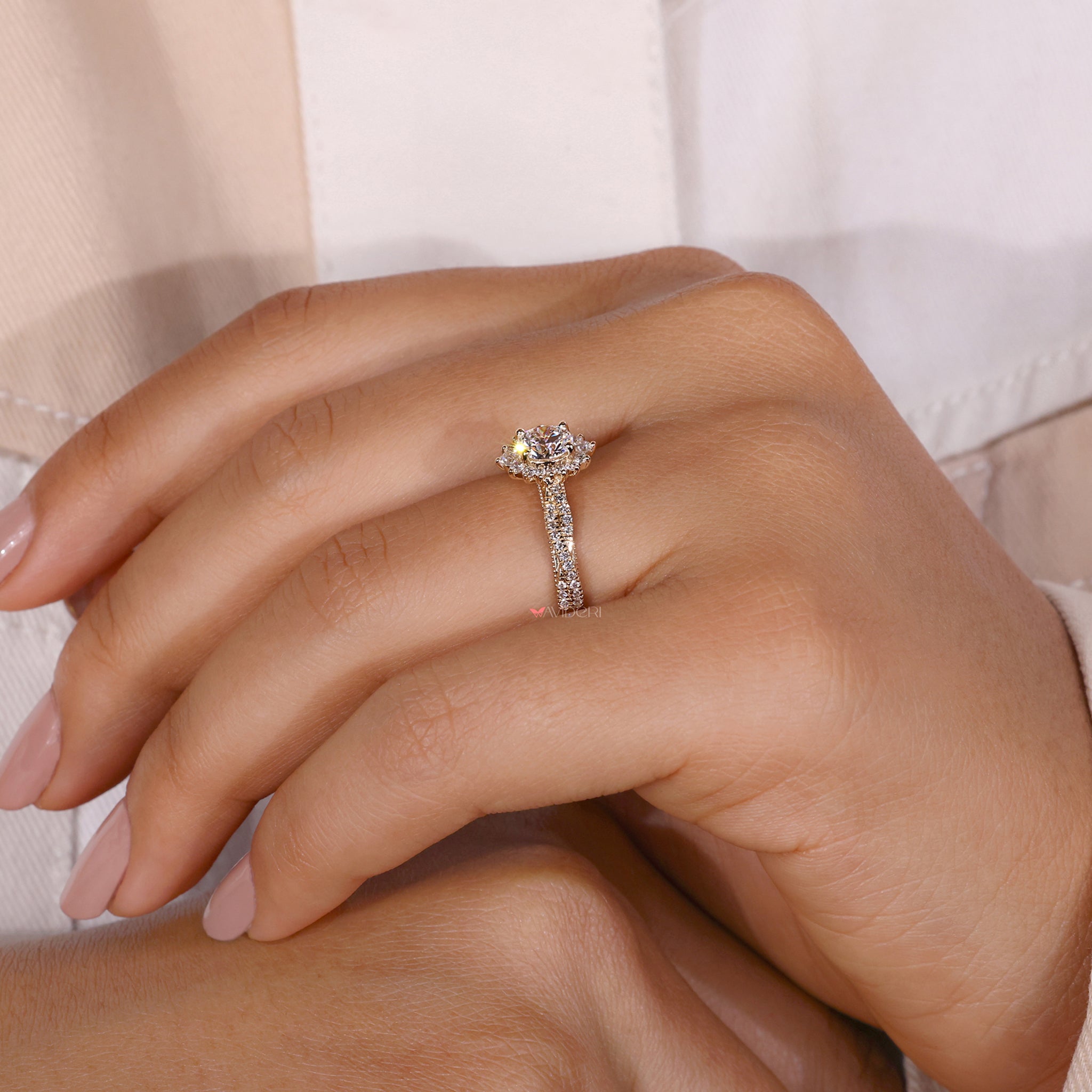 A twisted pave engagement ring with a unique and elegant design.
