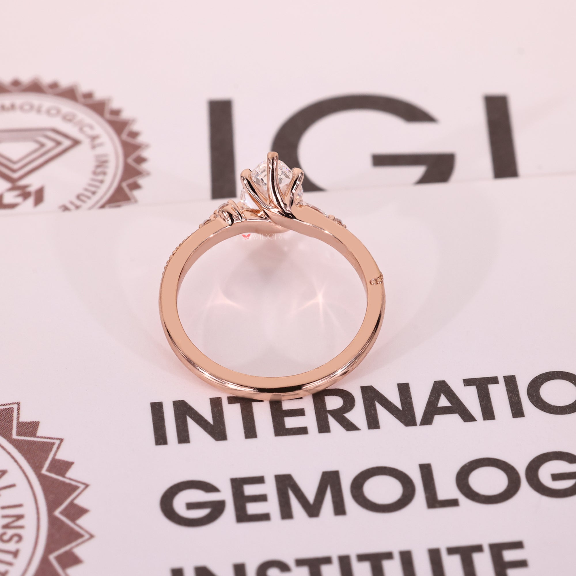 Rose gold engagement ring with lab-grown diamond ring.
