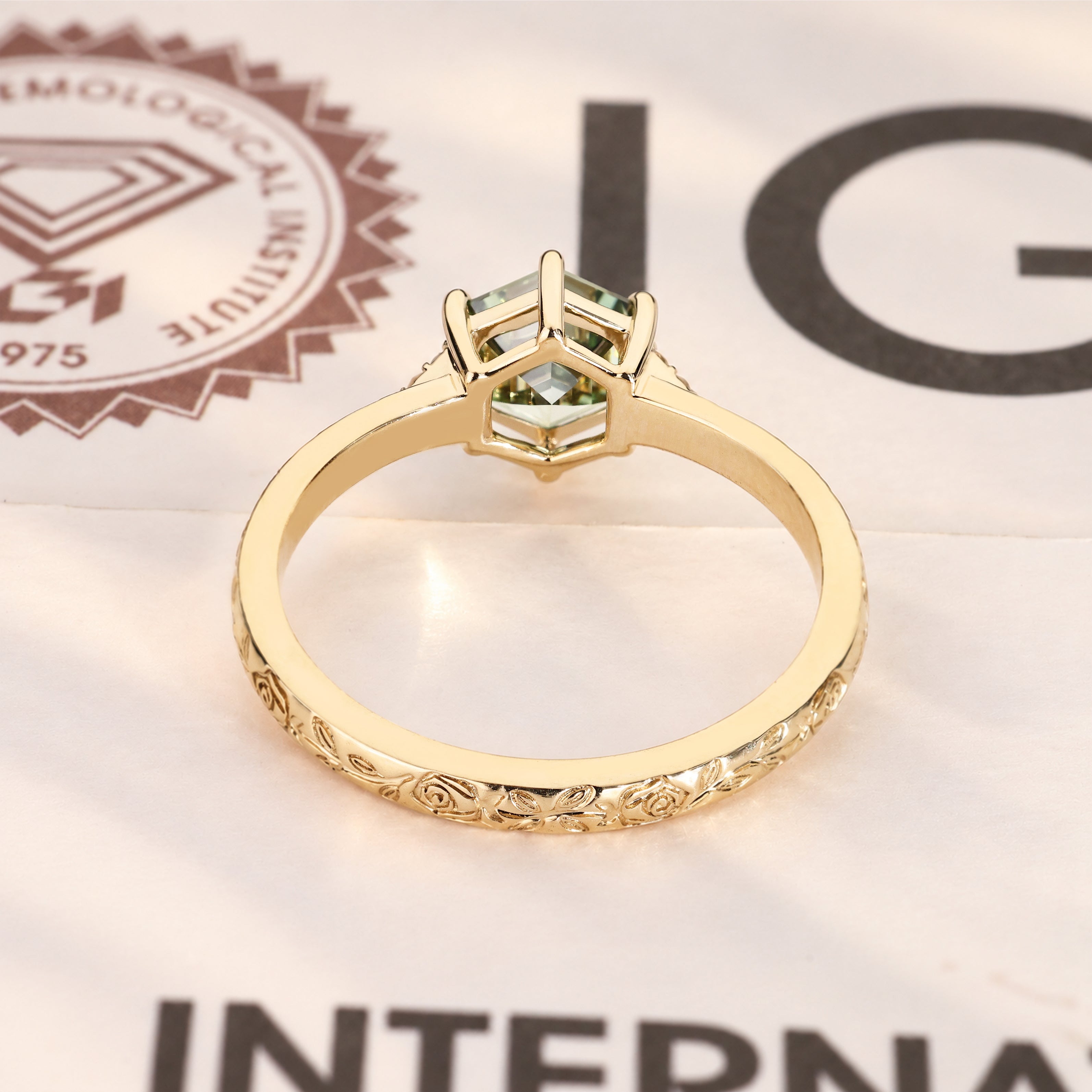 Lab grown green hexagon diamond engagement ring.

