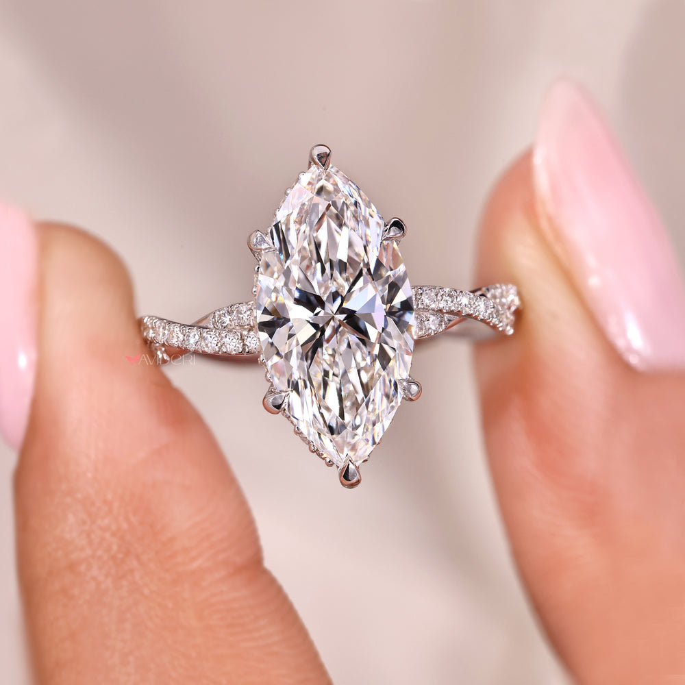 Twisted pave setting with lab-grown diamond ring.