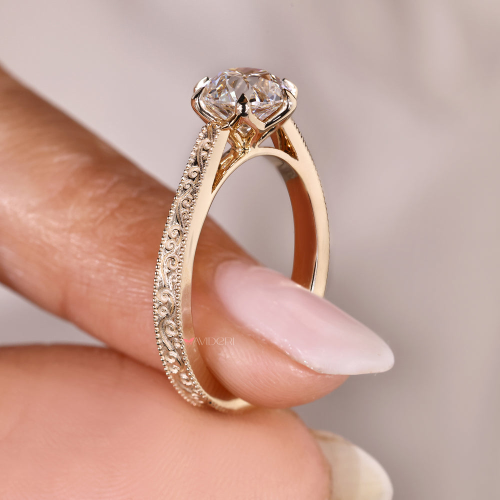 Solitaire diamond ring with tulip setting.
