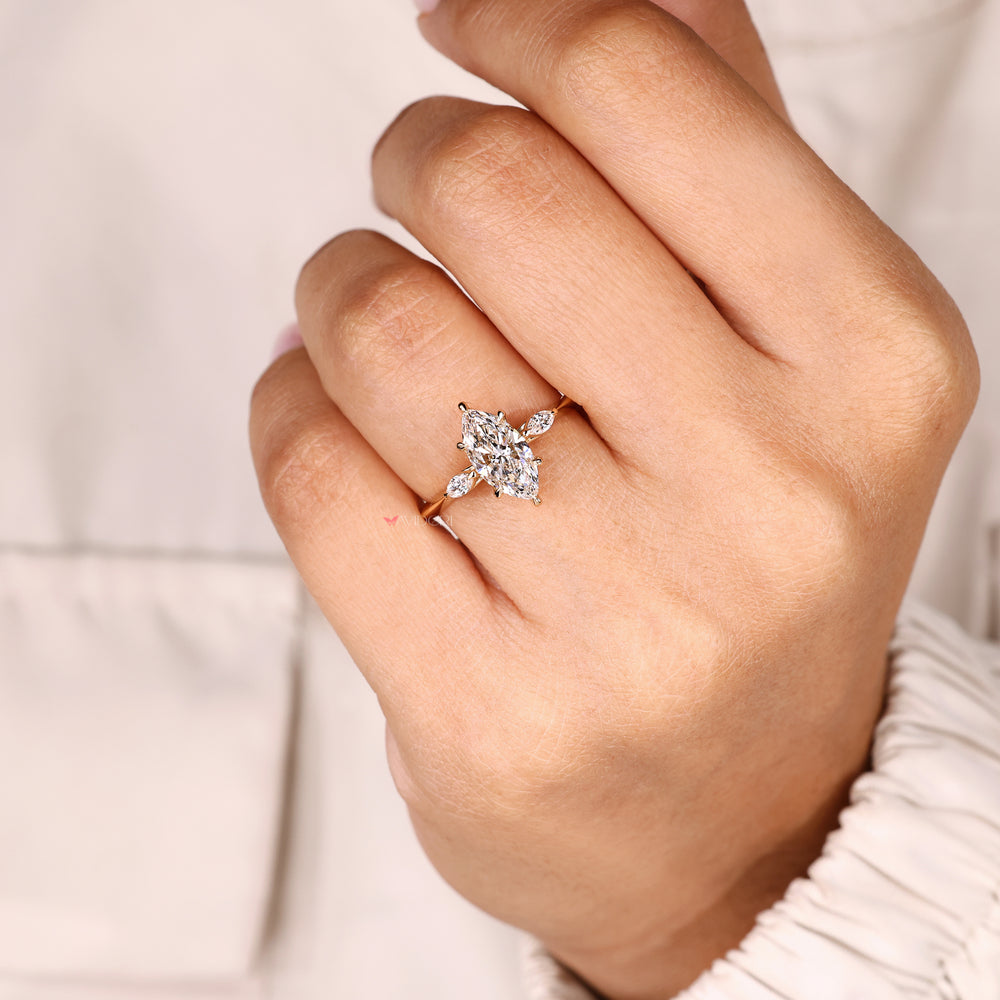 Lab grown marquise ring with tulip setting.
