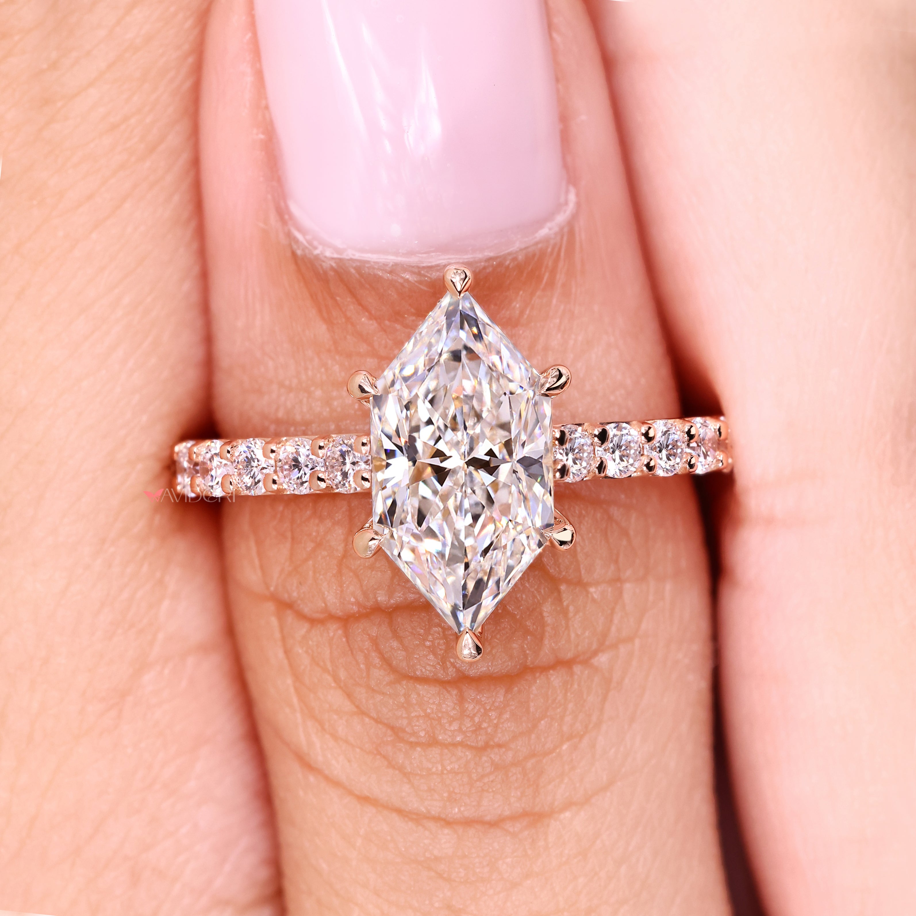 Lab grown Dutch marquise ring with halo style.

