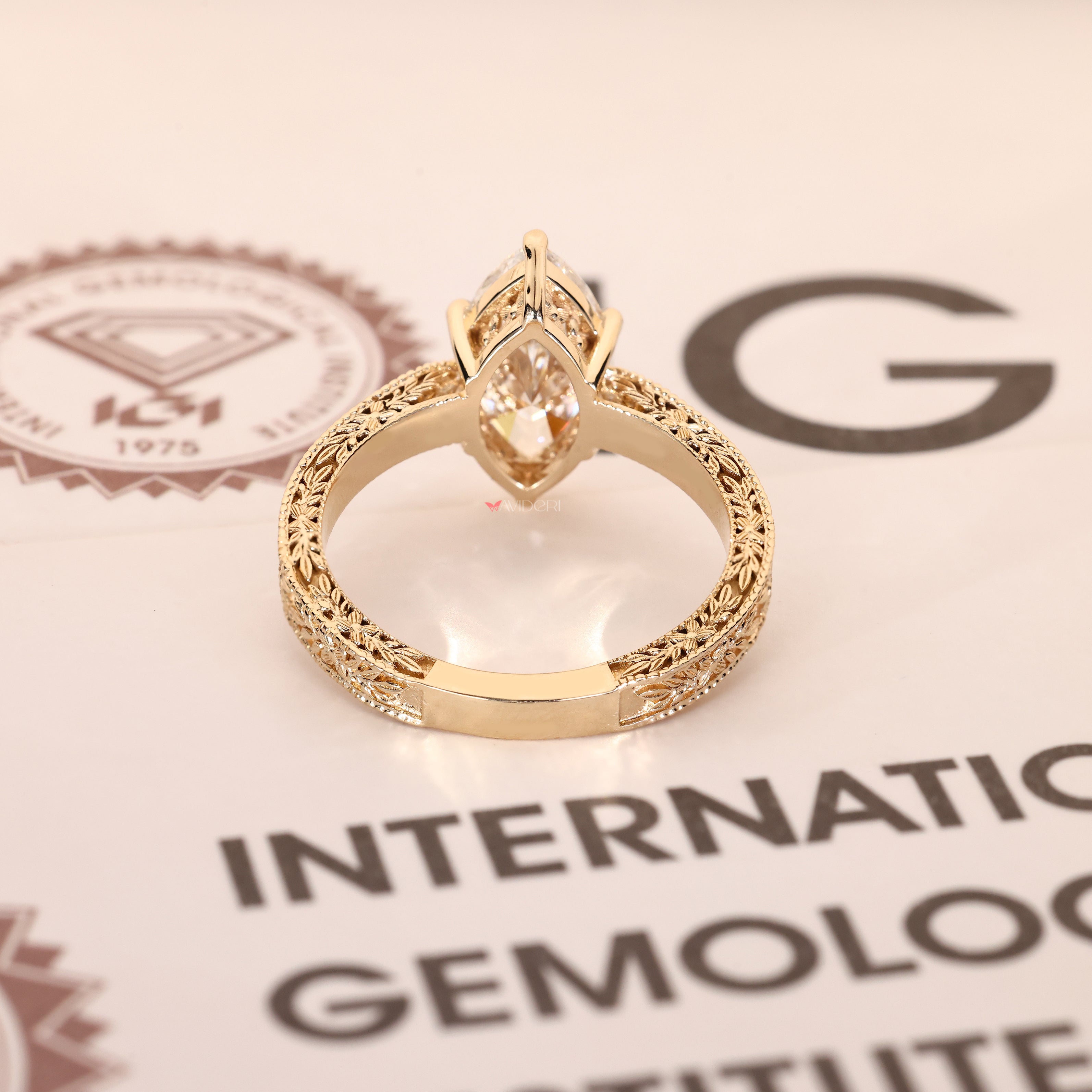 Art deco marquise diamond ring with vintage inspired details
