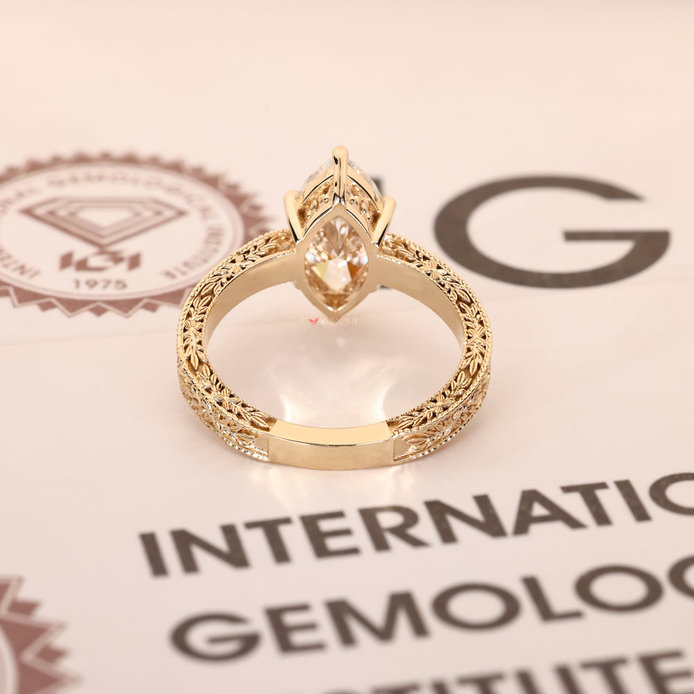 Art deco marquise diamond ring with vintage inspired details
