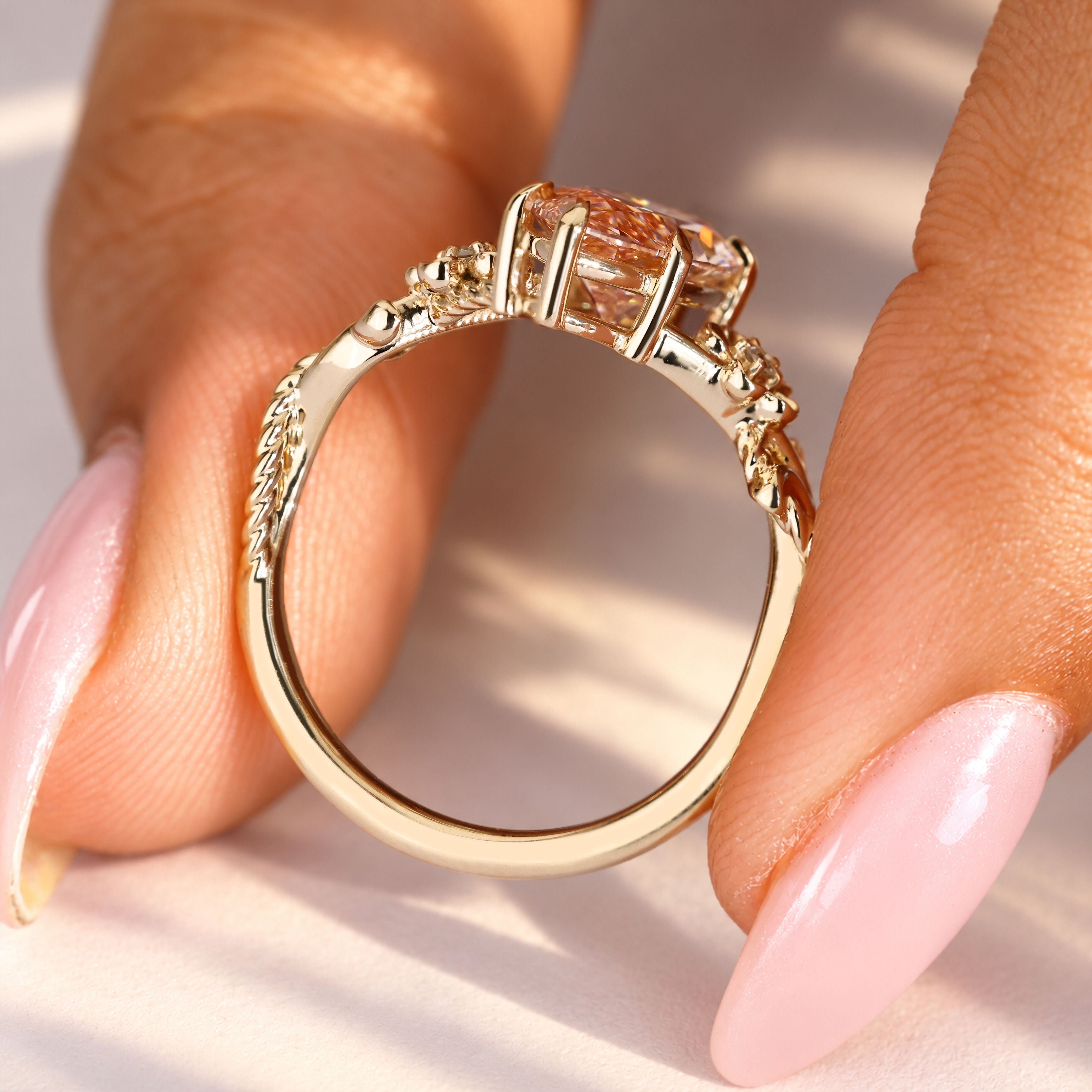 Vintage marquise diamond ring with floral detailing.

