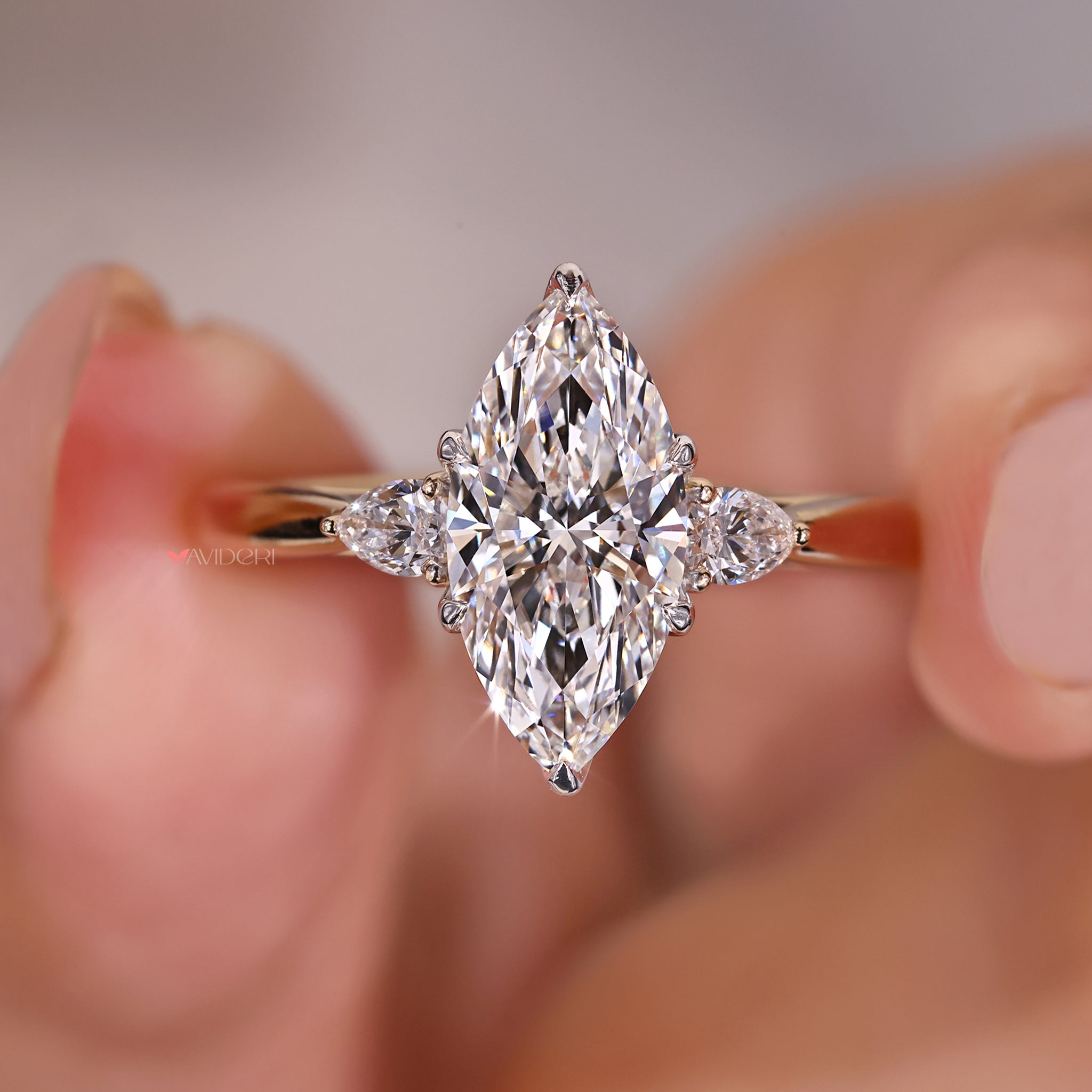 Six claw prong ring with a marquise center.