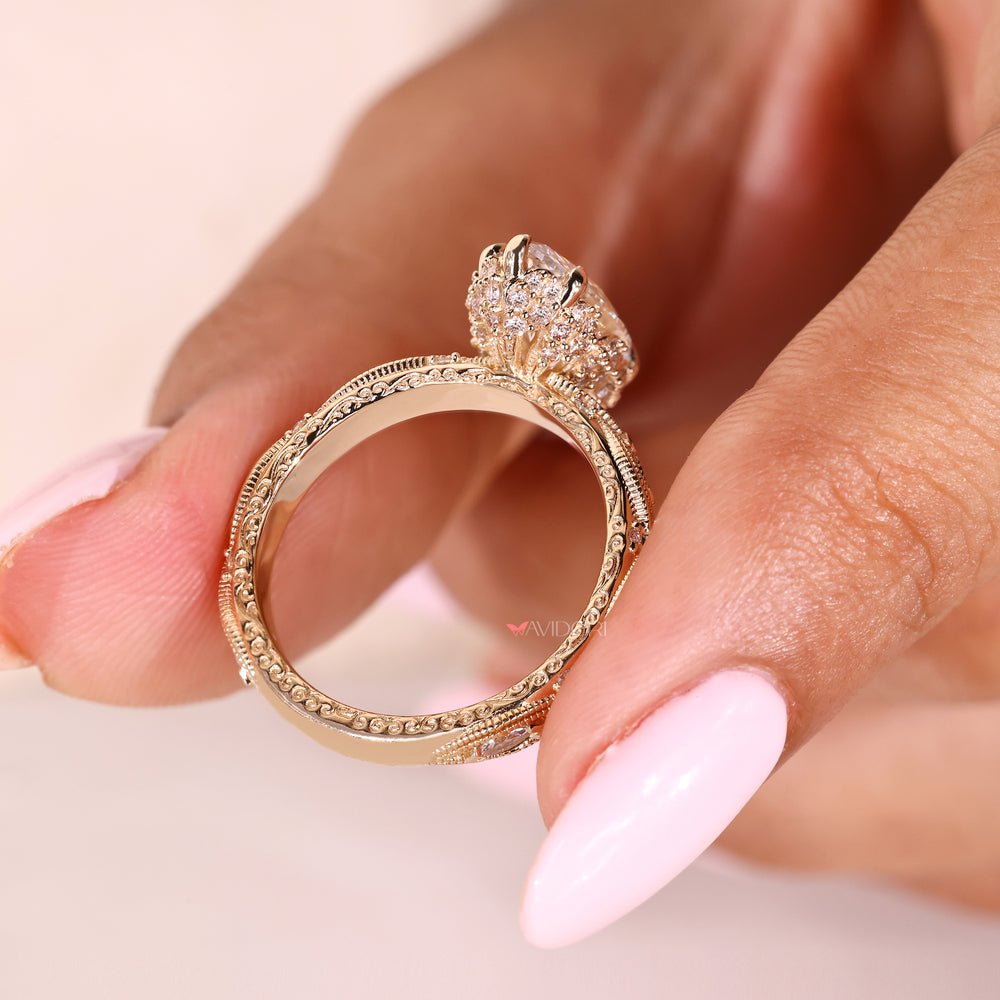 Handmade marquise engagement ring with pave and milgrain design
