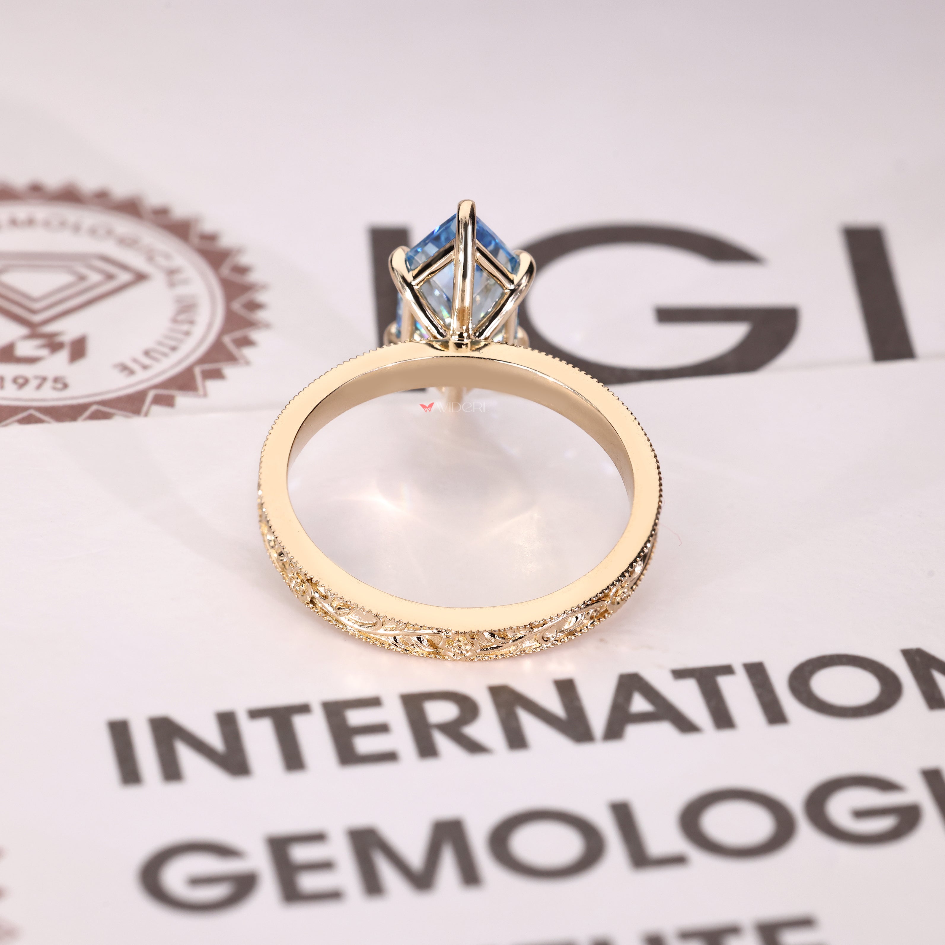 Blue center Dutch marquise diamond ring with solitaire setting
