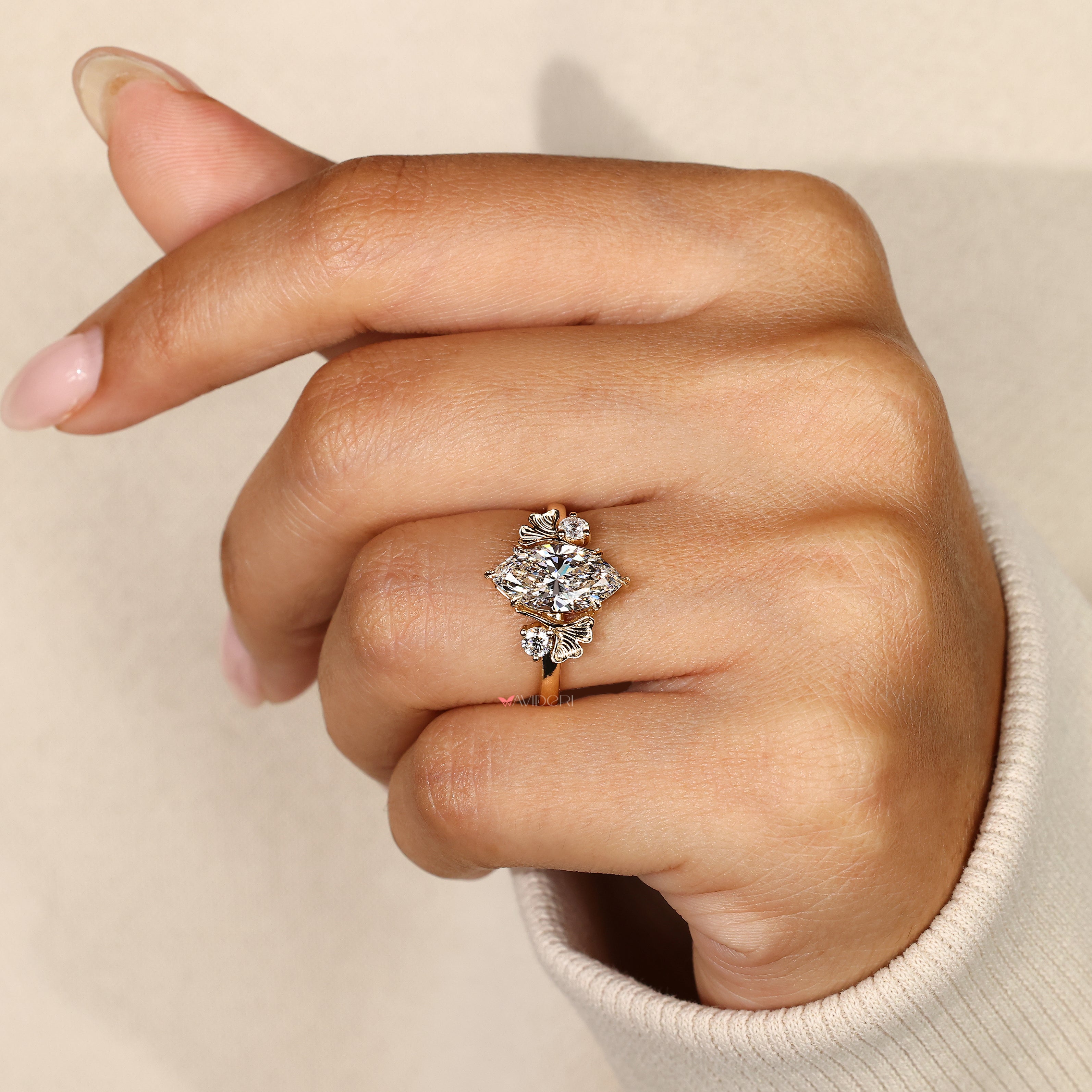 Three stone nature inspired diamond ring.
