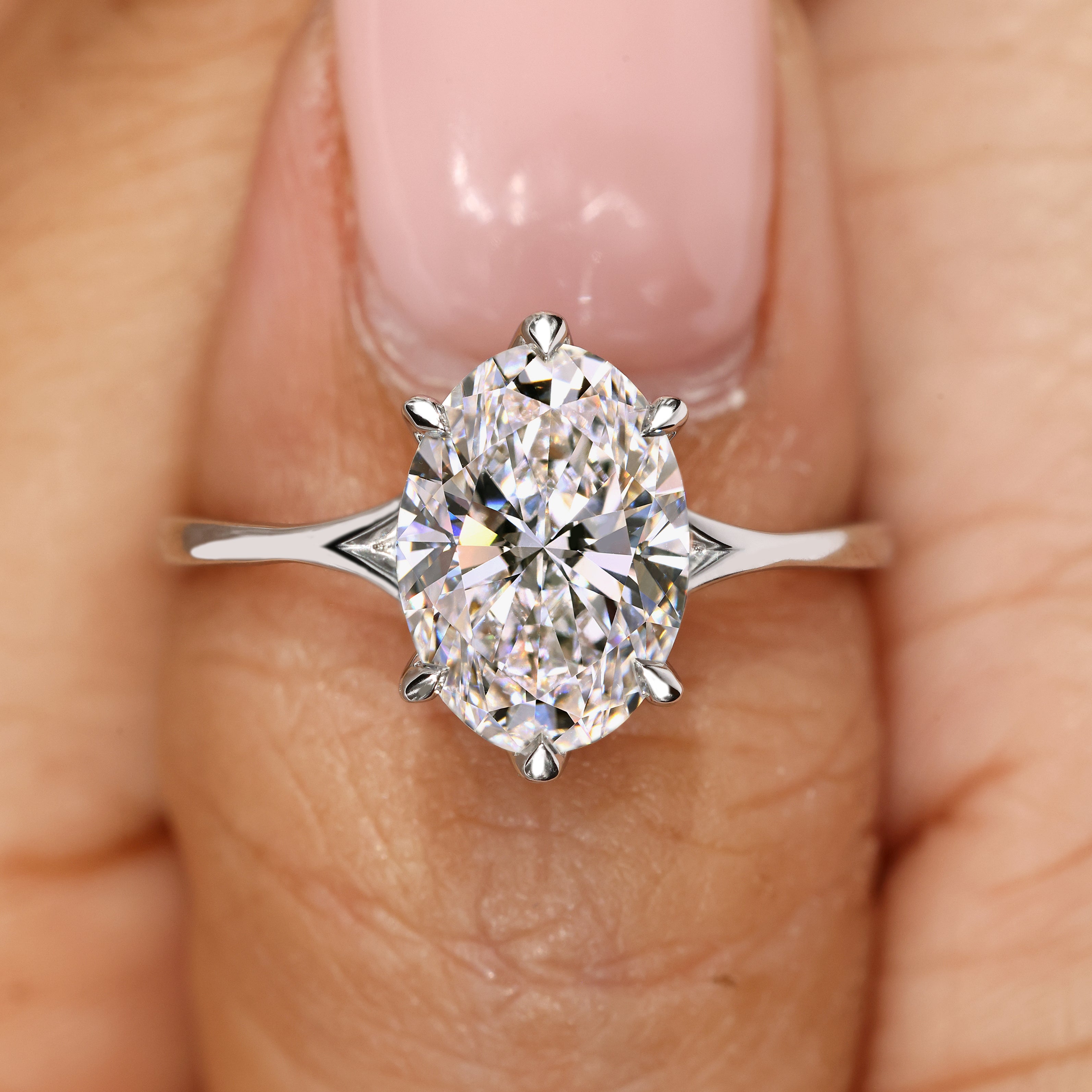 Lab grown oval diamond ring IGI certified.

