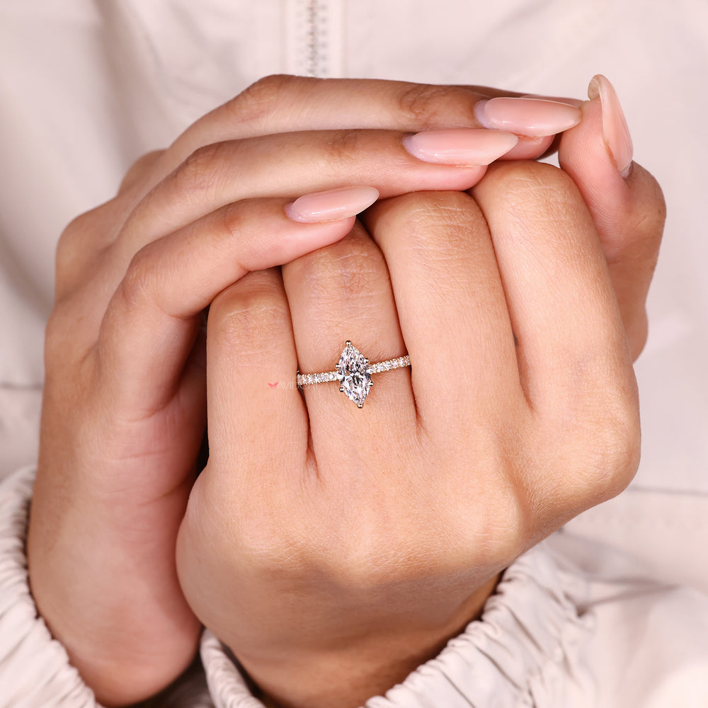 Lab grown marquise diamond pave engagement ring.
