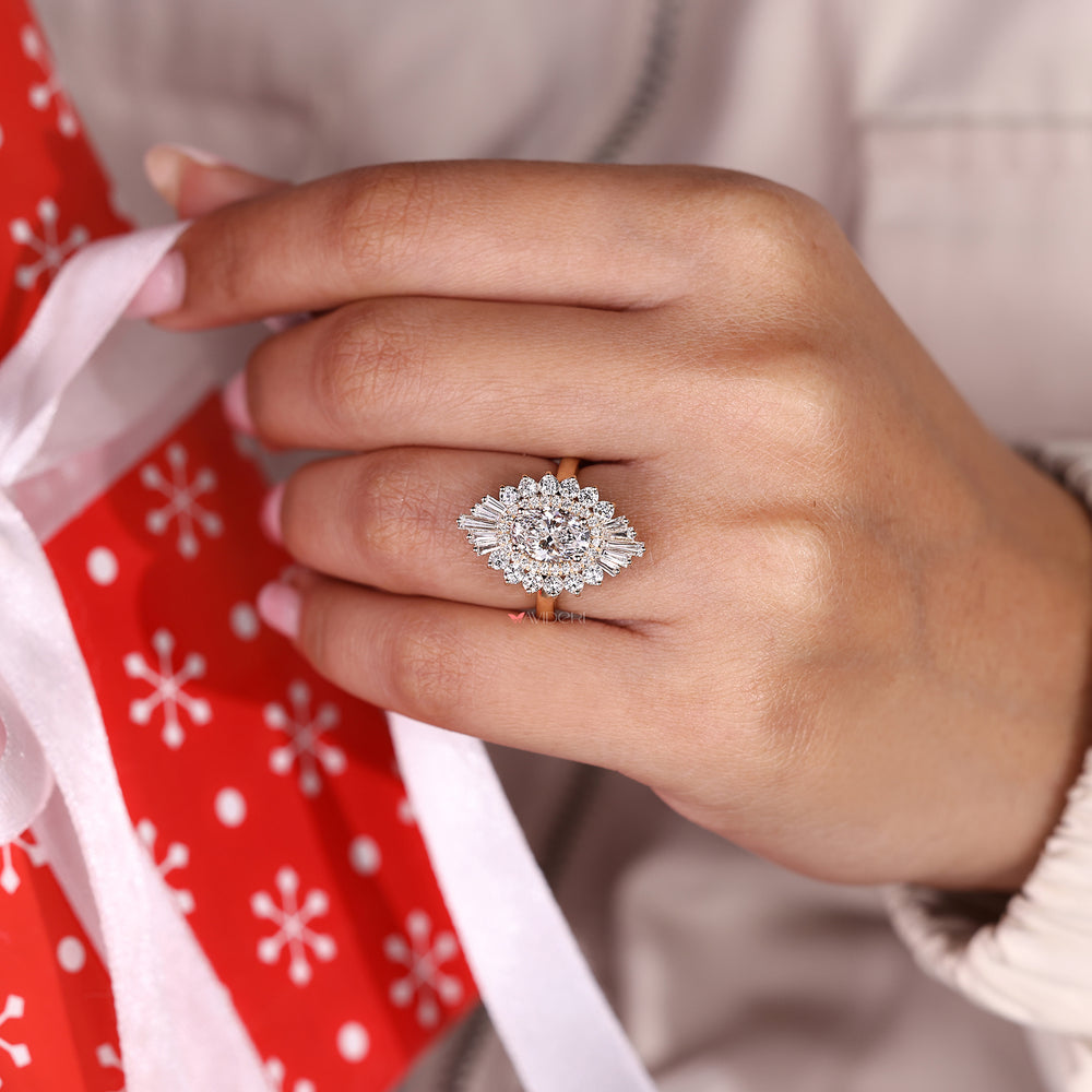 Oval diamond ring with tapered baguette side stones.
