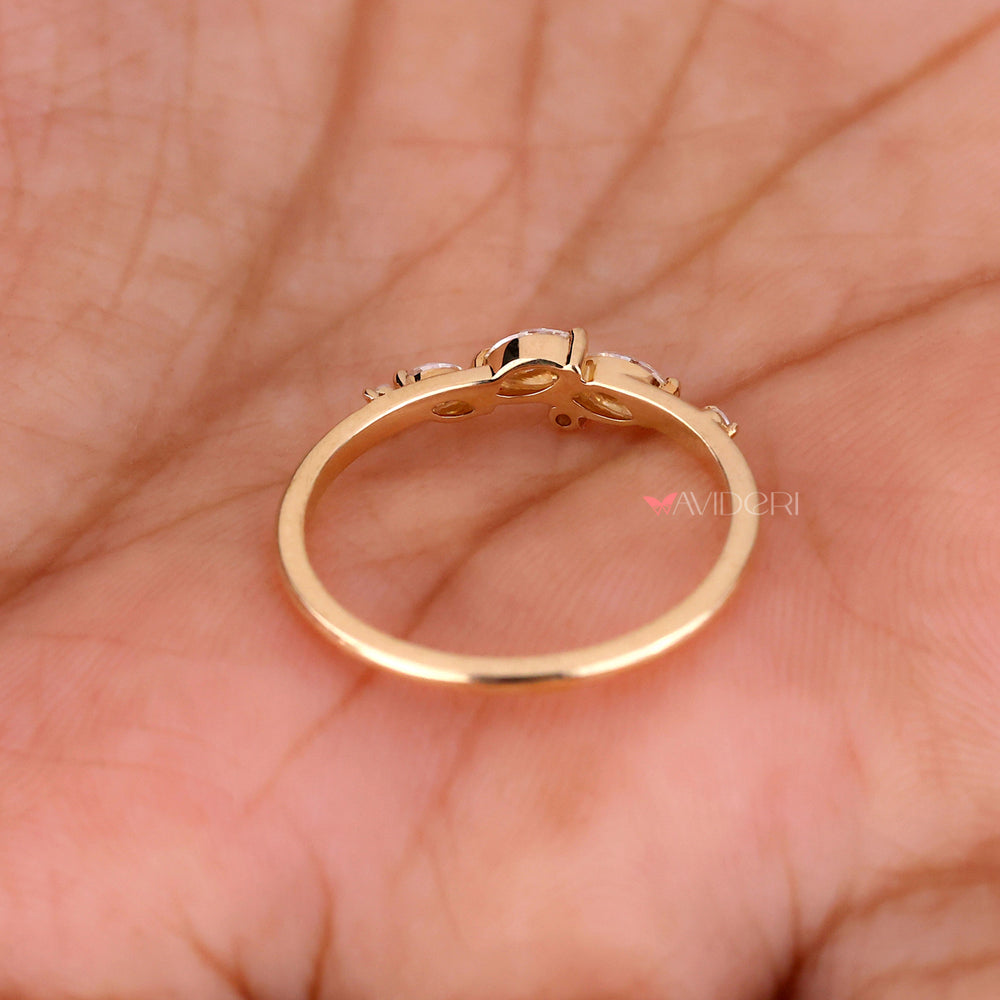 Marquise round diamond band with unique style.
