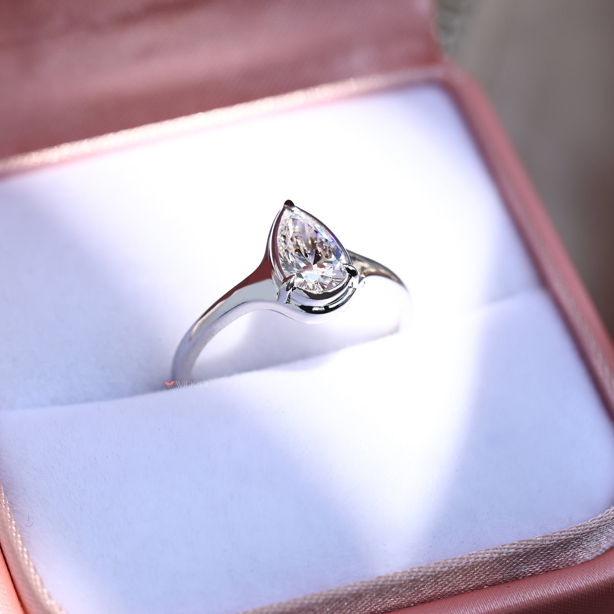 Solitaire engagement ring featuring a sparkling lab-grown diamond.