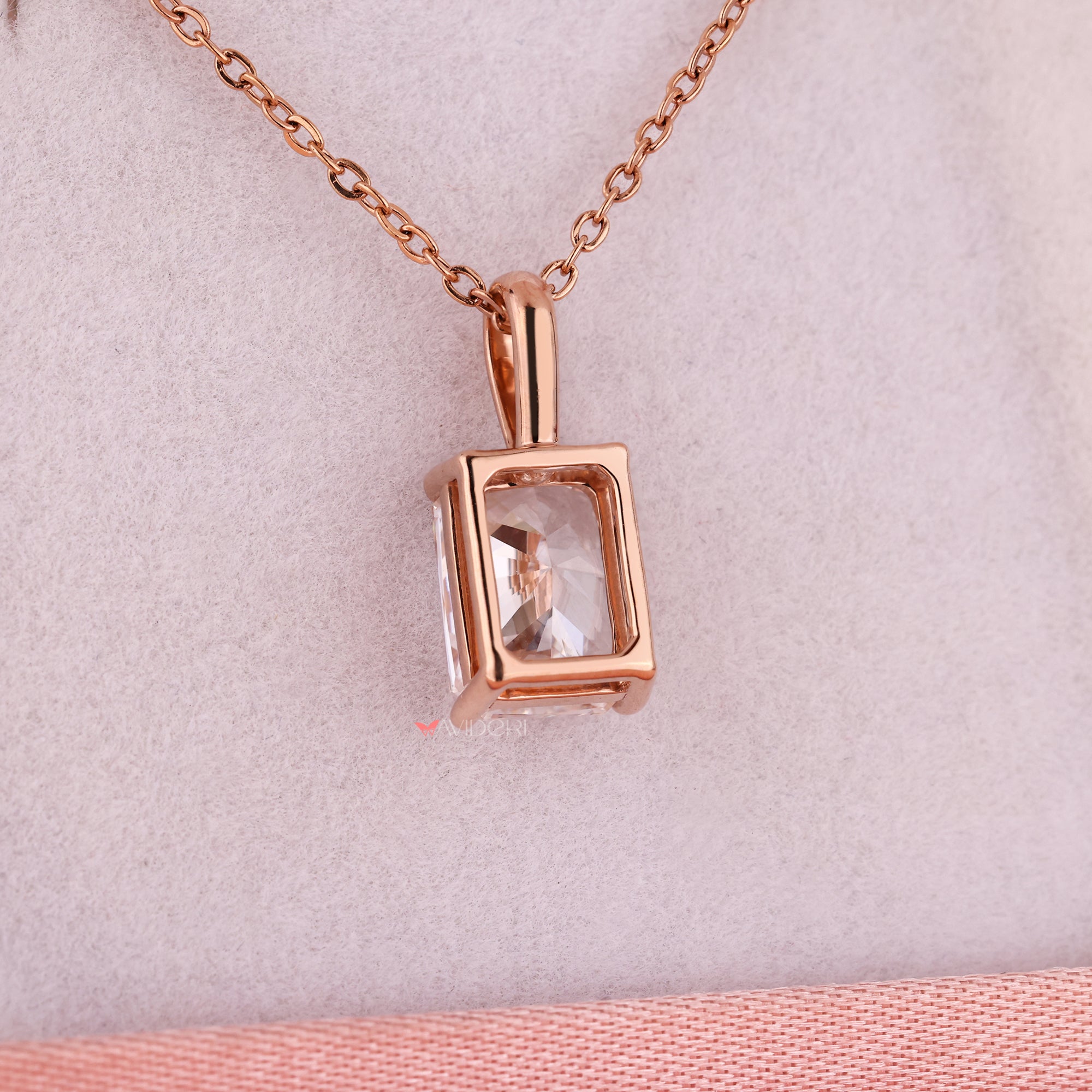 Rose gold pendant in solitaire pendant design.