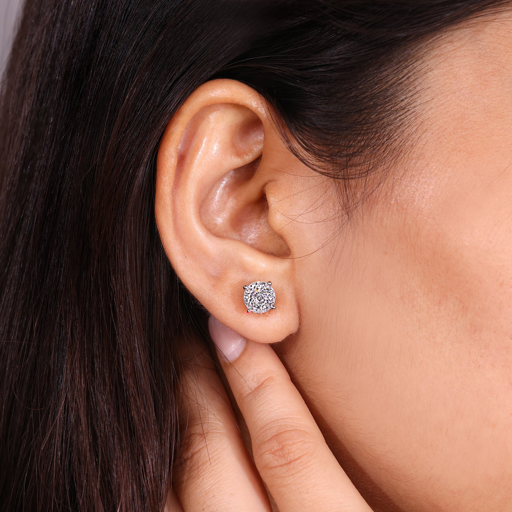 Lab grown diamond with handmade earrings.
