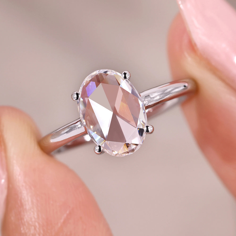 Handmade ring with solitaire diamond engagement ring.