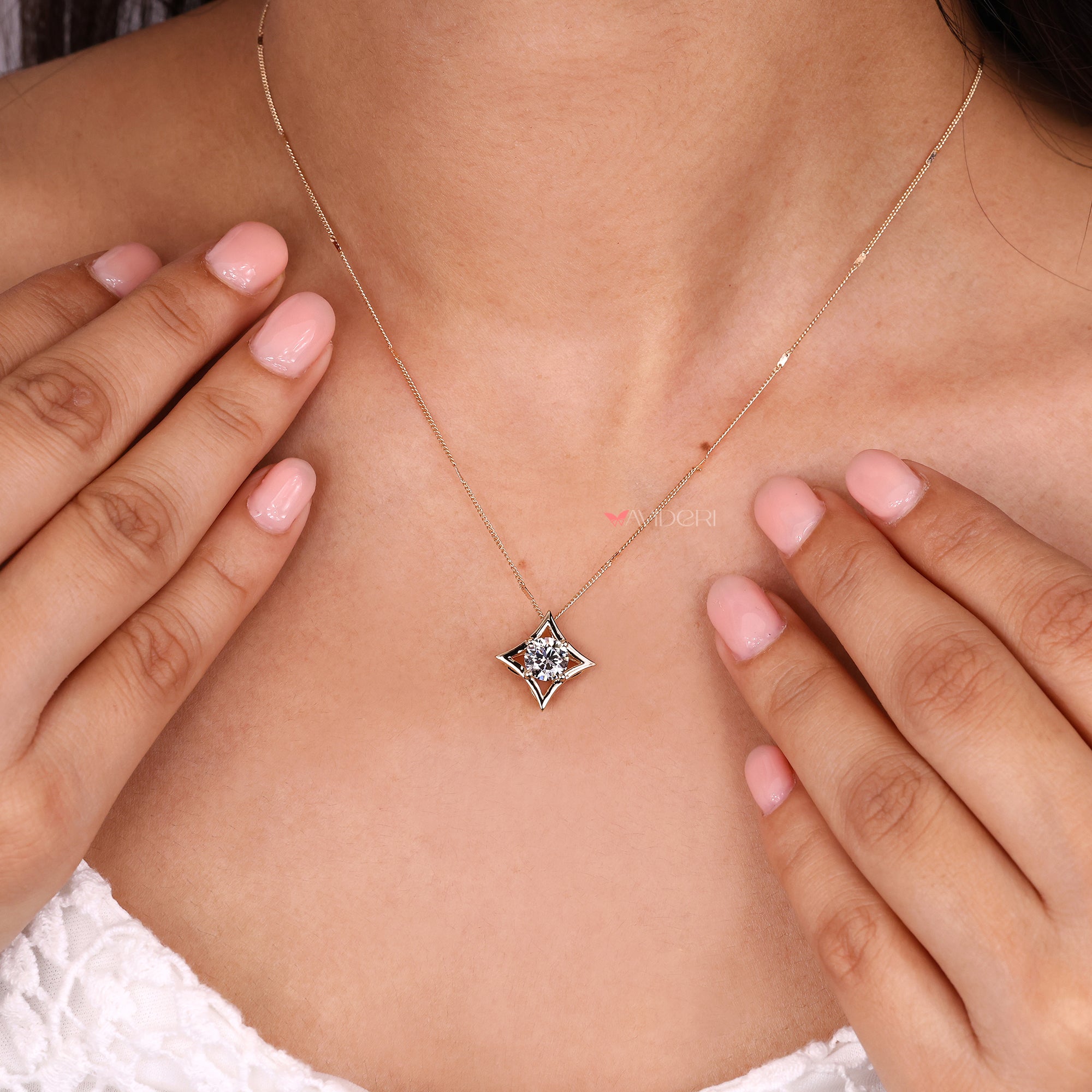 Solitaire diamond pendant with yellow gold pendant.