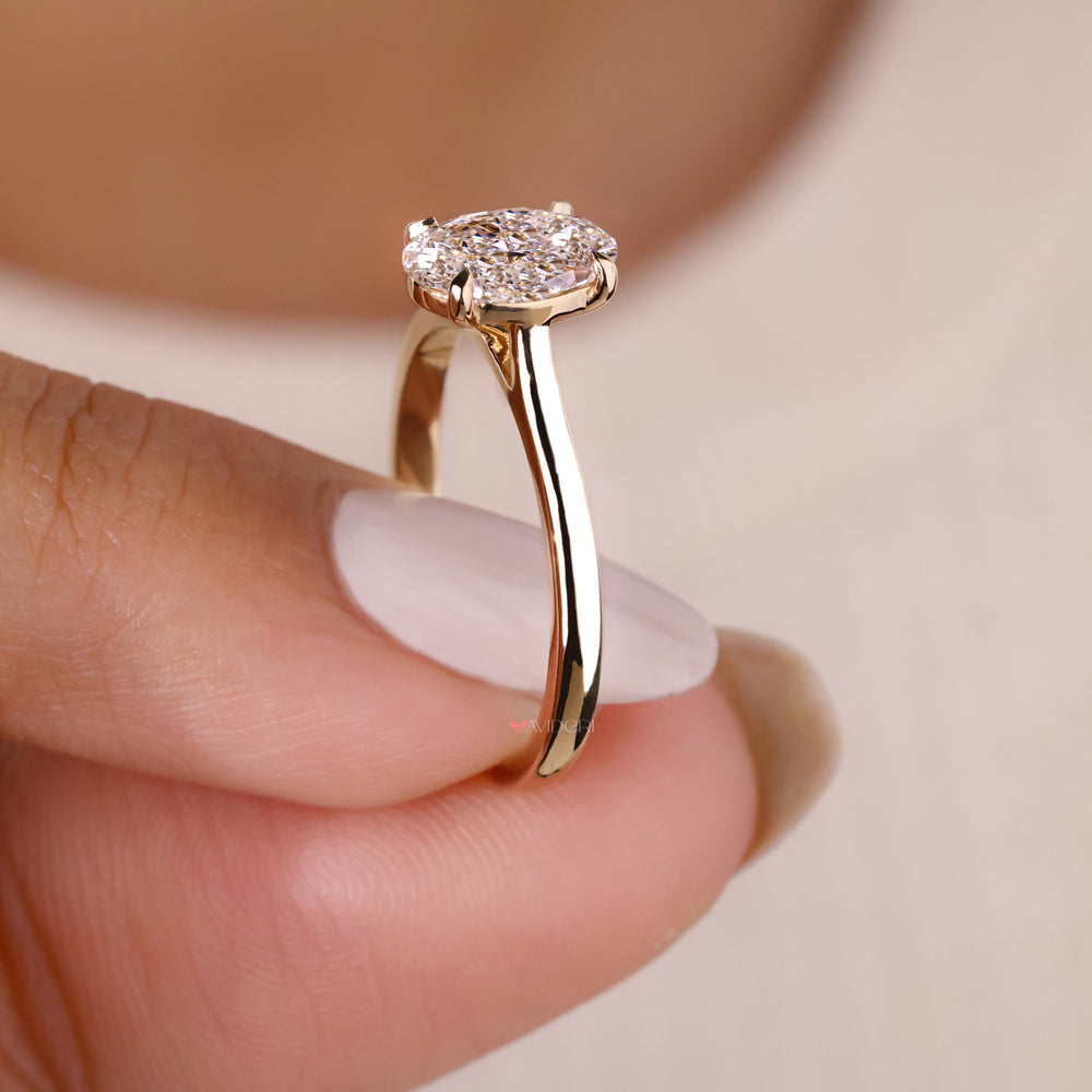 Oval diamond highlighted in a solitaire setting, blending classic charm with modern sophistication.
